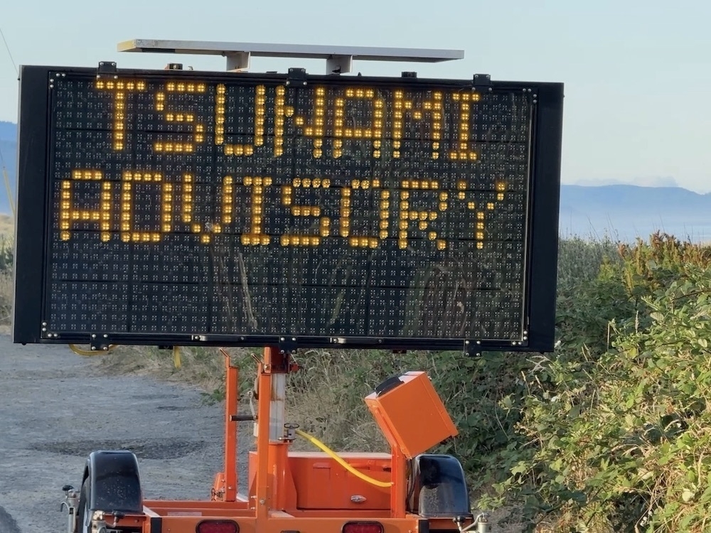 Tsunami Advisory warning sign on the coast