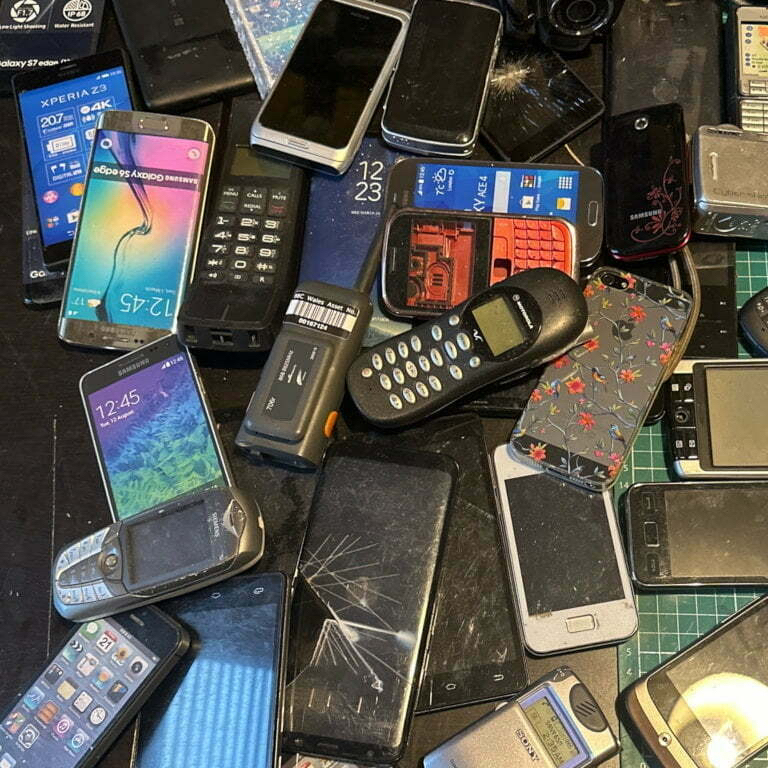 A box of mobile phones used in Doctor Who production