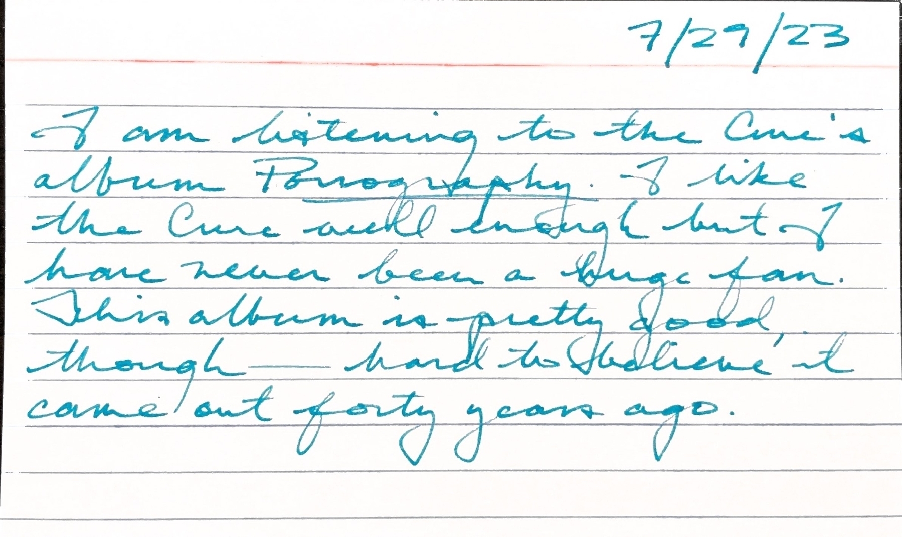 Handwritten index card about listening to The Cure