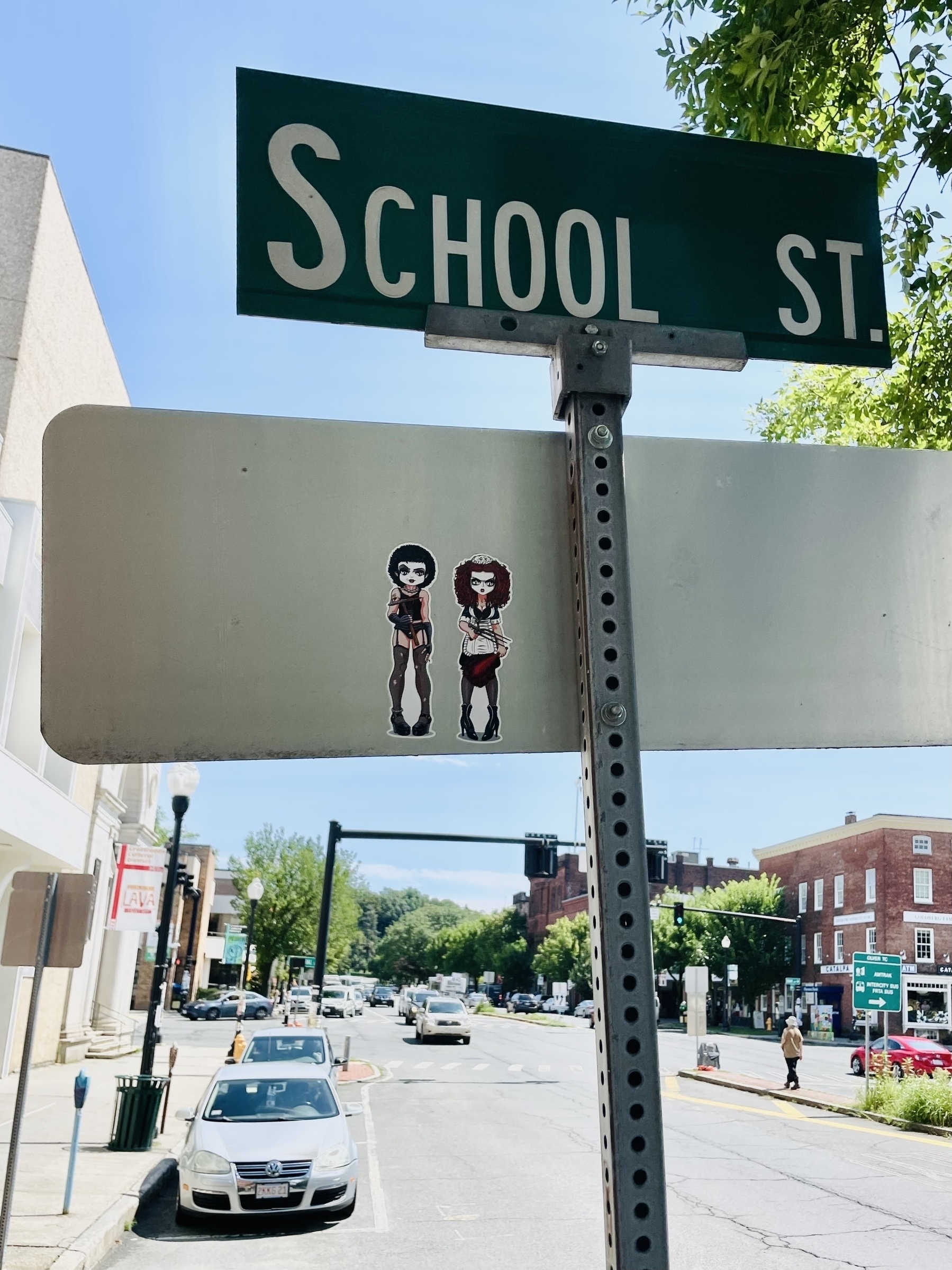 Rocky Horror stickers on the back of a street sign downtown 