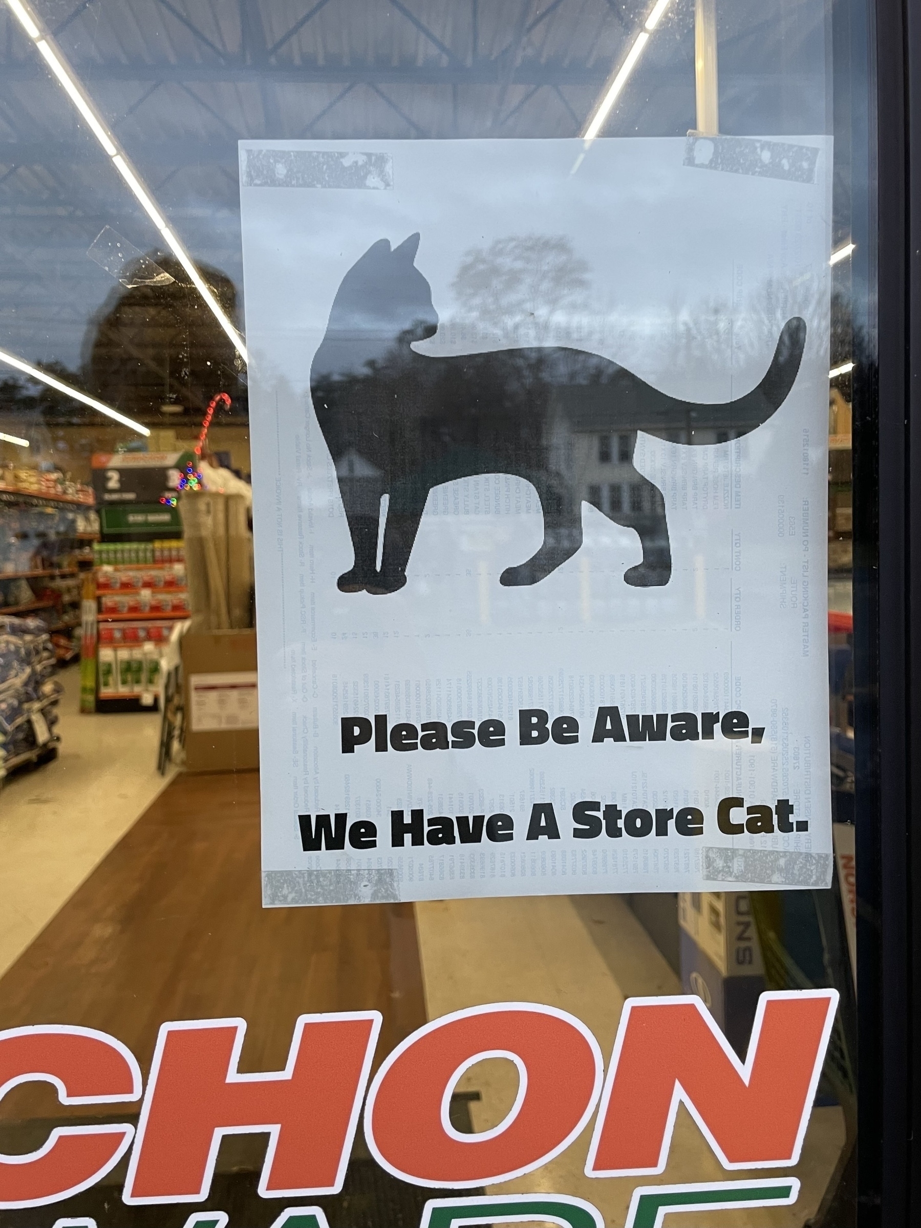 A sign about the store cat at Aubuchons Hardware