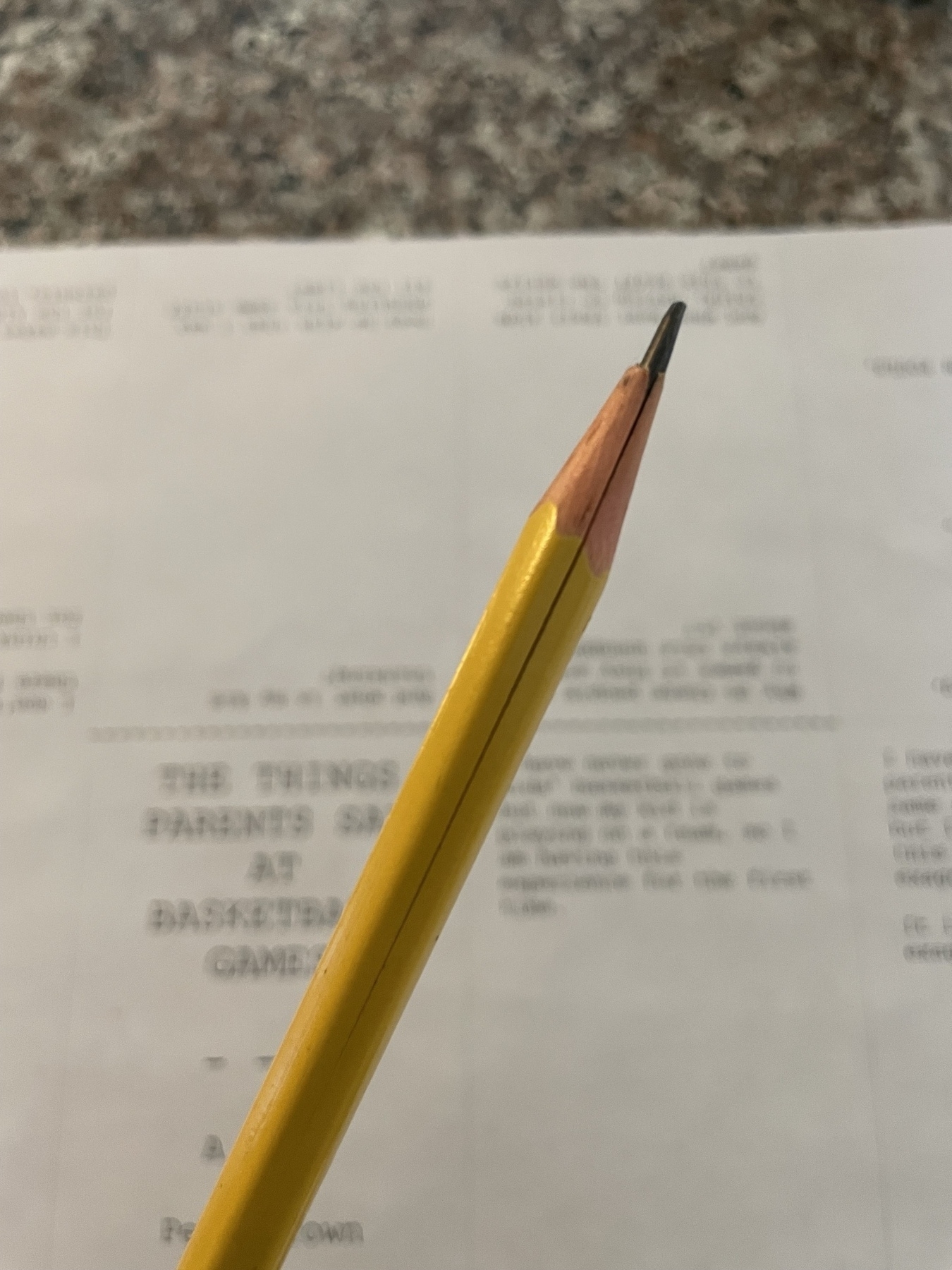 A yellow pencil with a crack down the side 