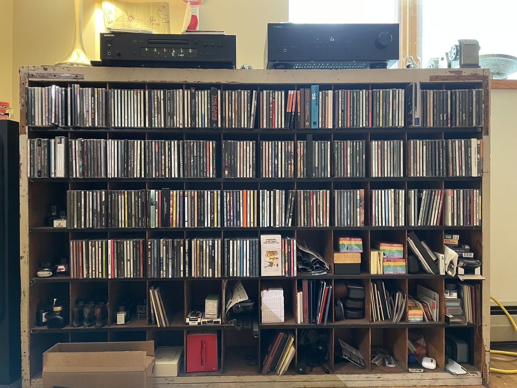compact discs on a shelf