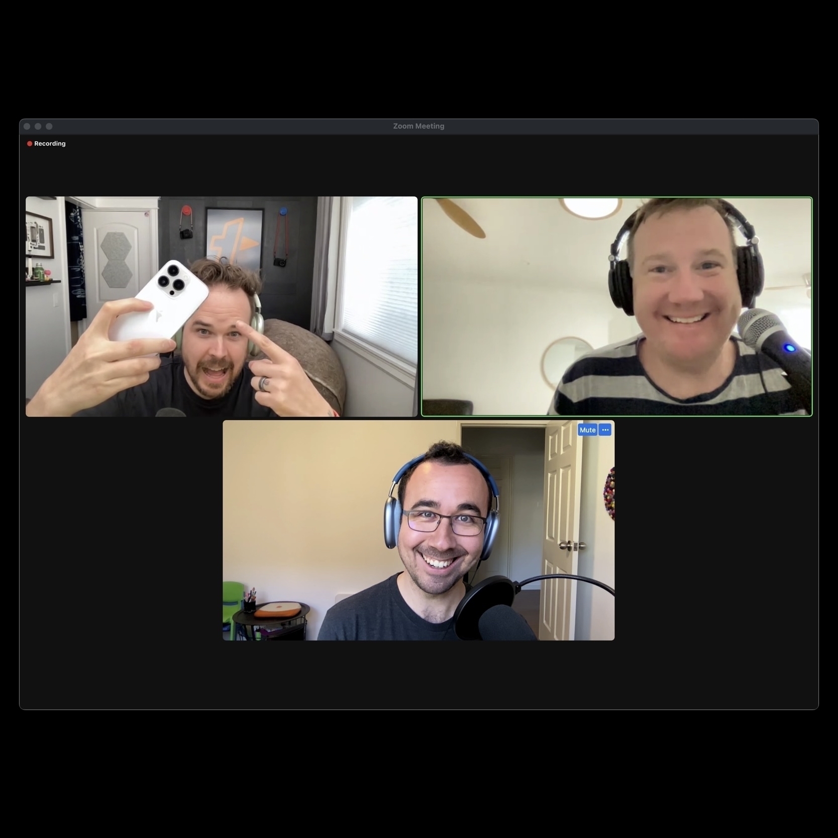 Three smiling hosts in separate Zoom video chat windows, with the top left showing an iPhone.