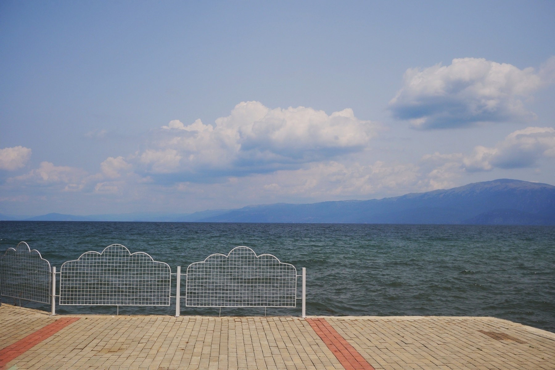 Cloud fence by the pier in Pogradec 