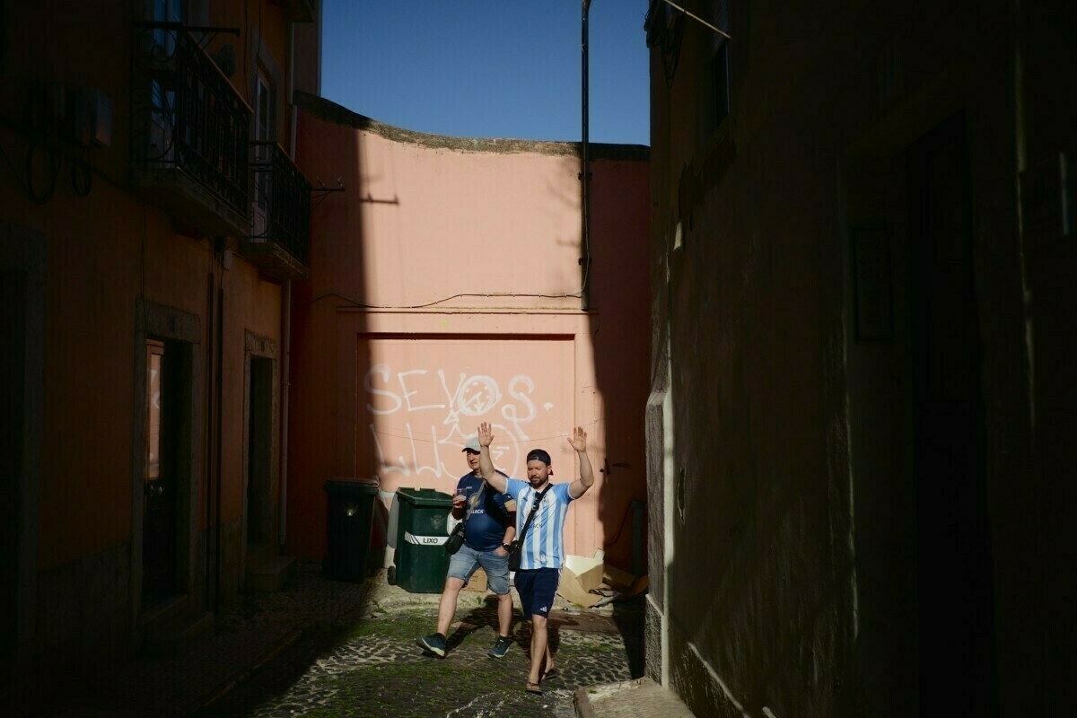 tourists in an alley