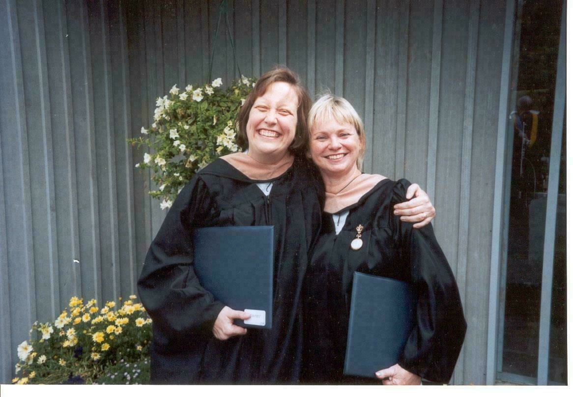 Jen Kramer and Barbara Hall, having just left graduation ceremonies in late August 2001.