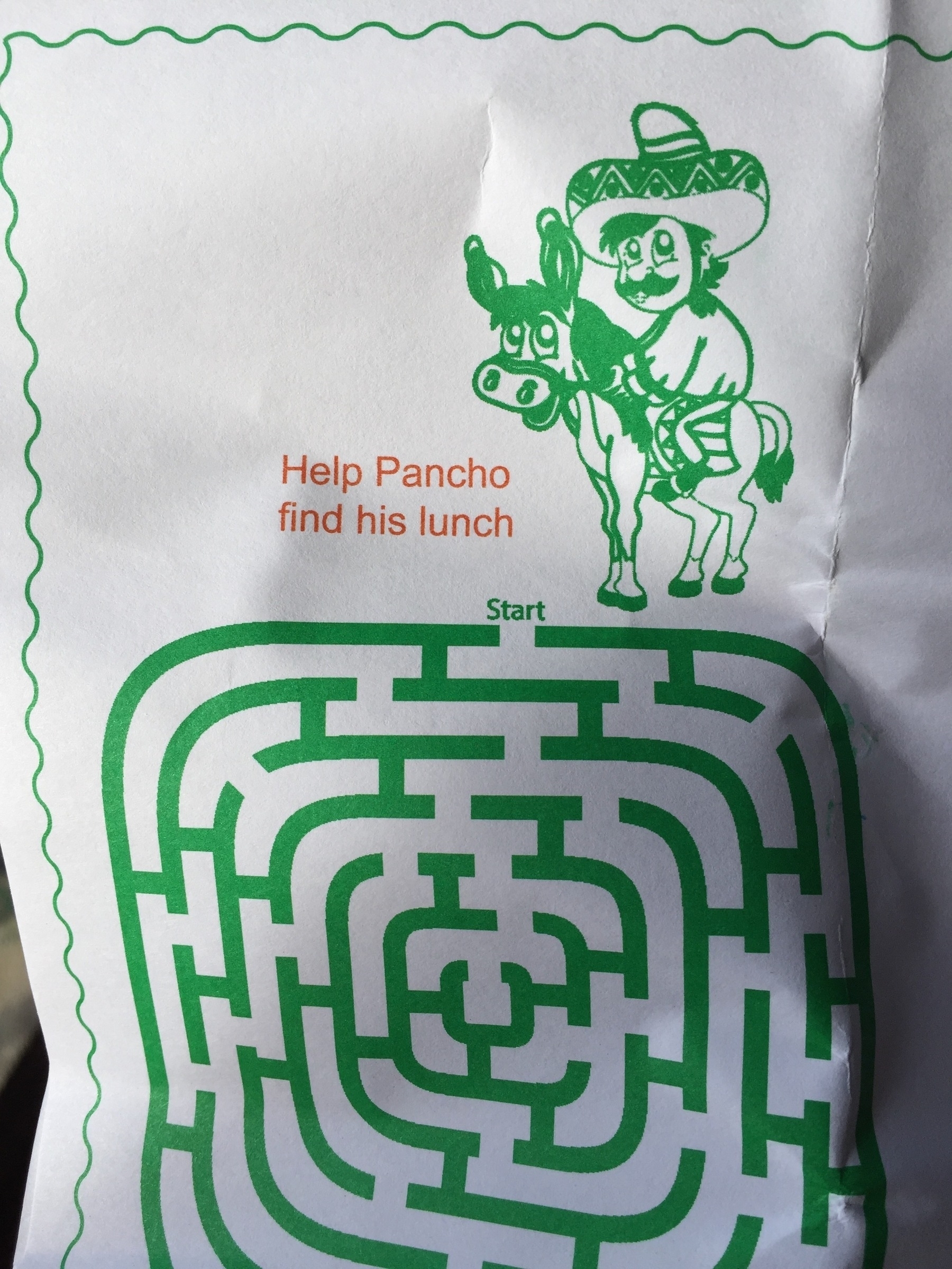 Auto-generated description: A cartoon character in a sombrero, riding a donkey, is placed above a maze with the text Help Pancho find his lunch.