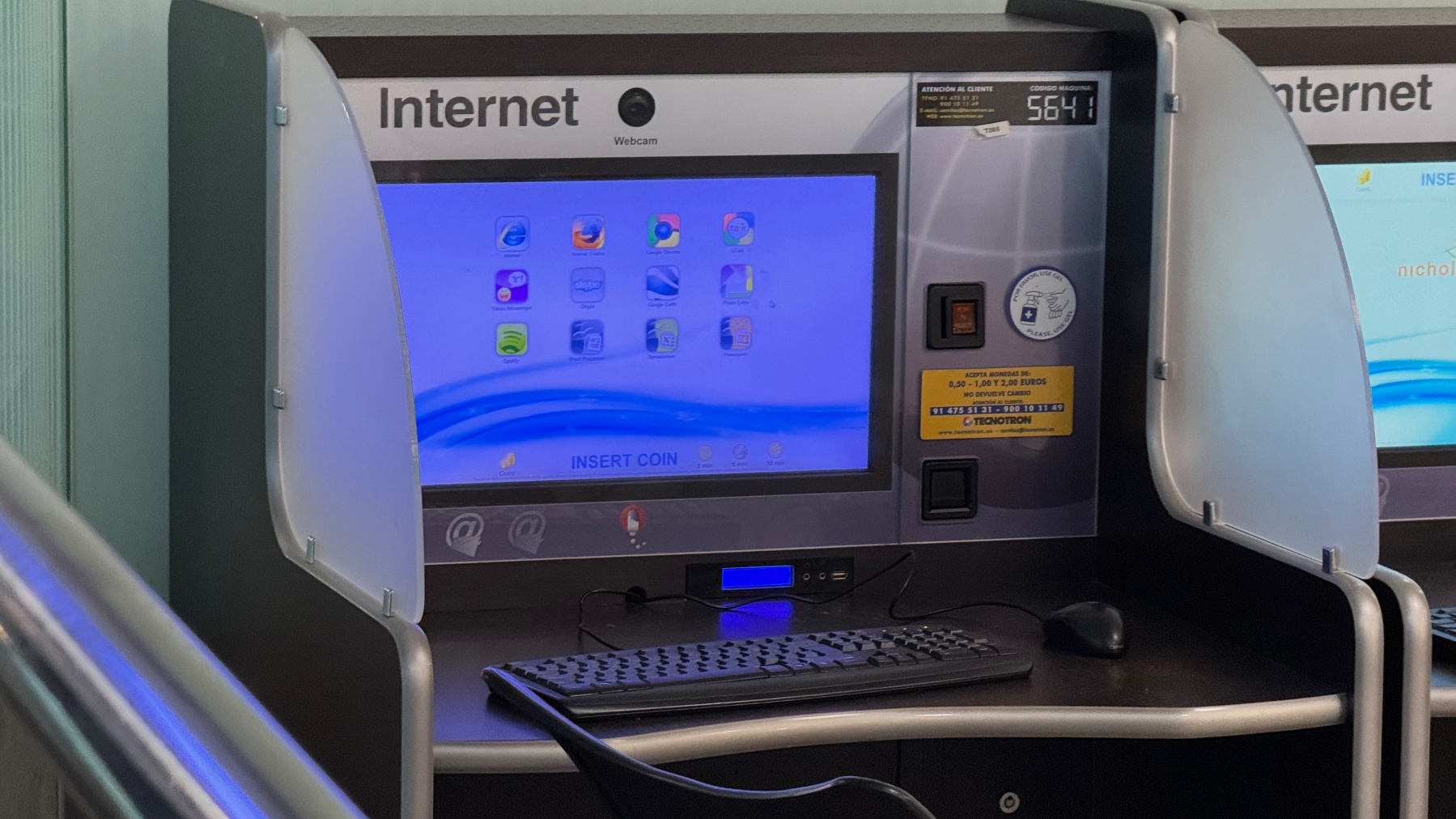 Internet coin-operated kiosk with INSERT COIN on the screen