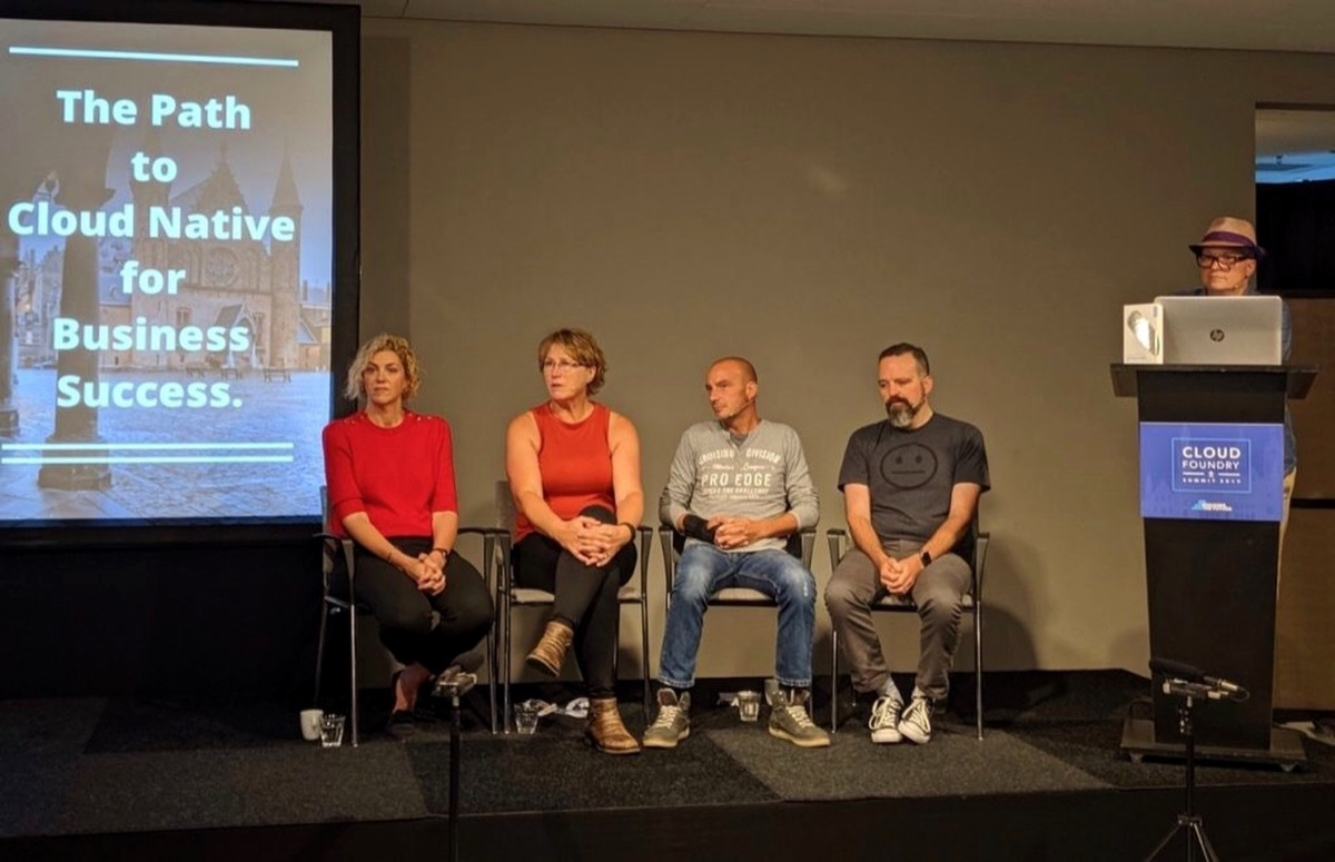 Four-person panel at Cloud Foundry Summit 2019, 'The Path to Cloud Native for Business Success' slide behind them. Coté on the right in a sad-face t-shirt.