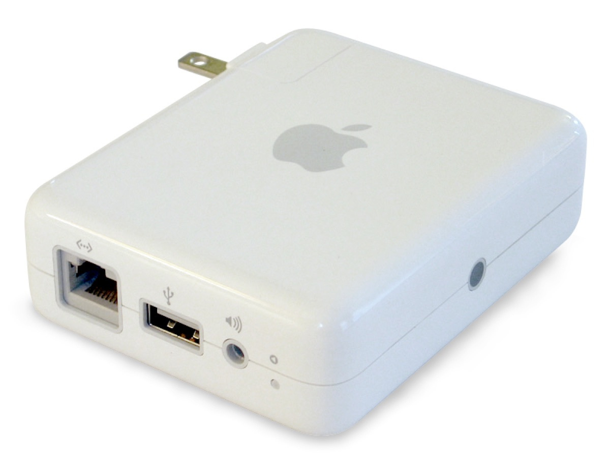 Apple AirPort Express, the small white square base station.