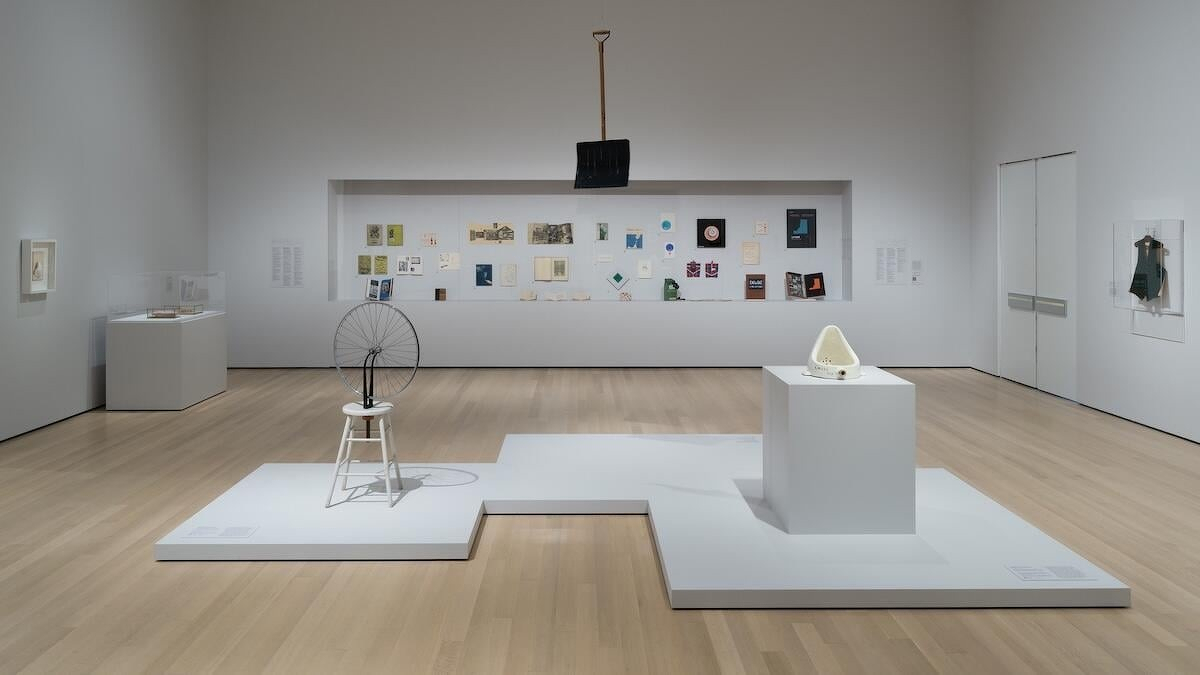 Installation view at MoMA showing Marcel Duchamp readymade objects in a gallery.