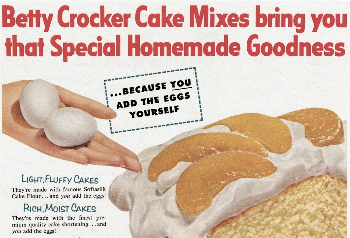 Vintage Betty Crocker cake-mix print ad showing a hand holding two eggs next to a frosted layer cake. Headline: 'Betty Crocker Cake Mixes bring you that Special Homemade Goodness... BECAUSE YOU ADD THE EGGS YOURSELF.'