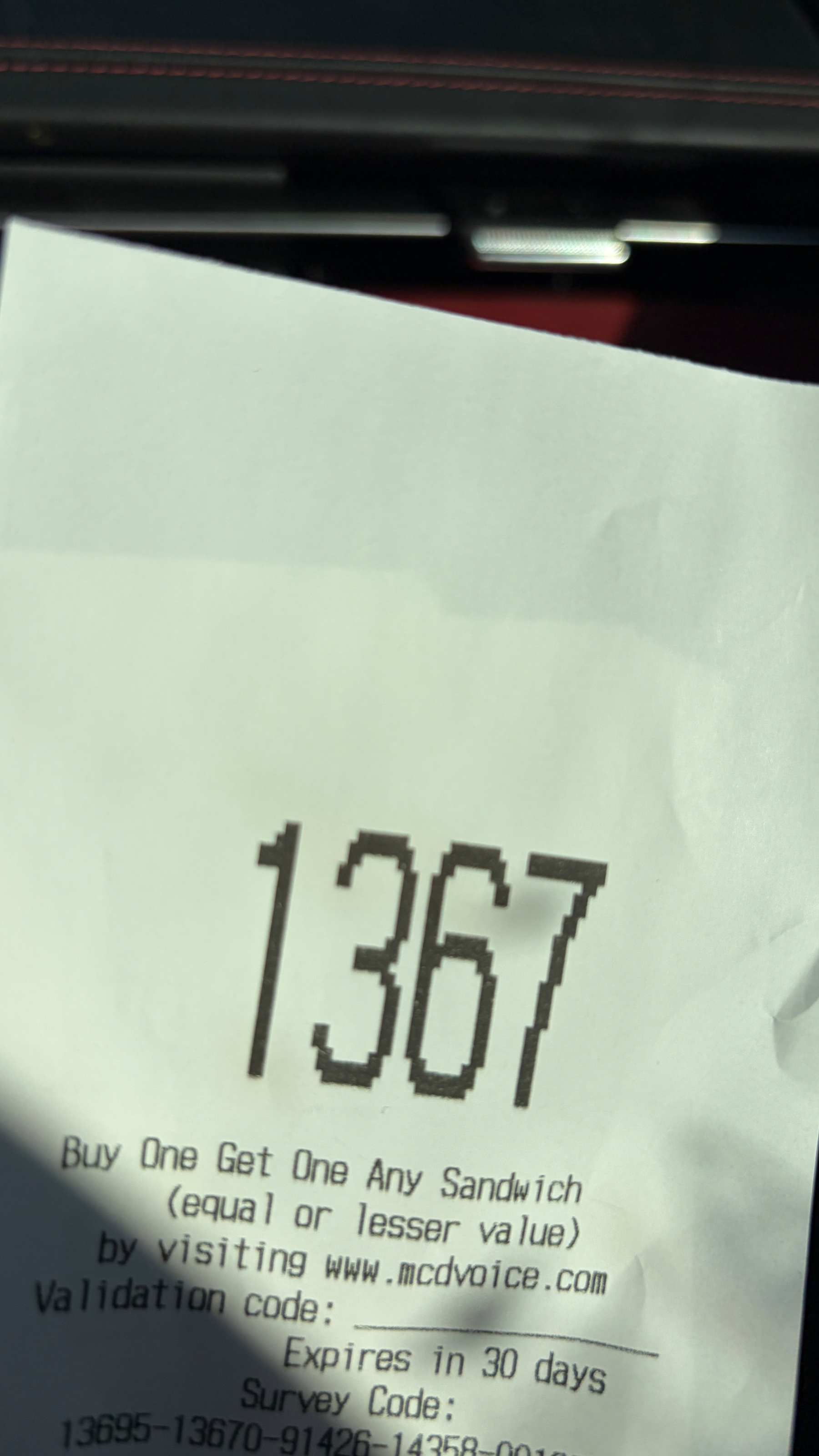 Receipt with “1367” printed in large digits at the top
