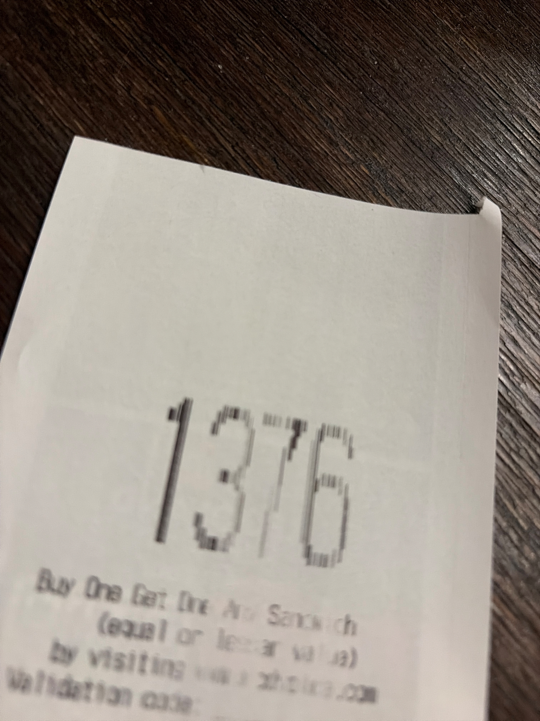 a receipt with “1376” printed in large numerals at the top