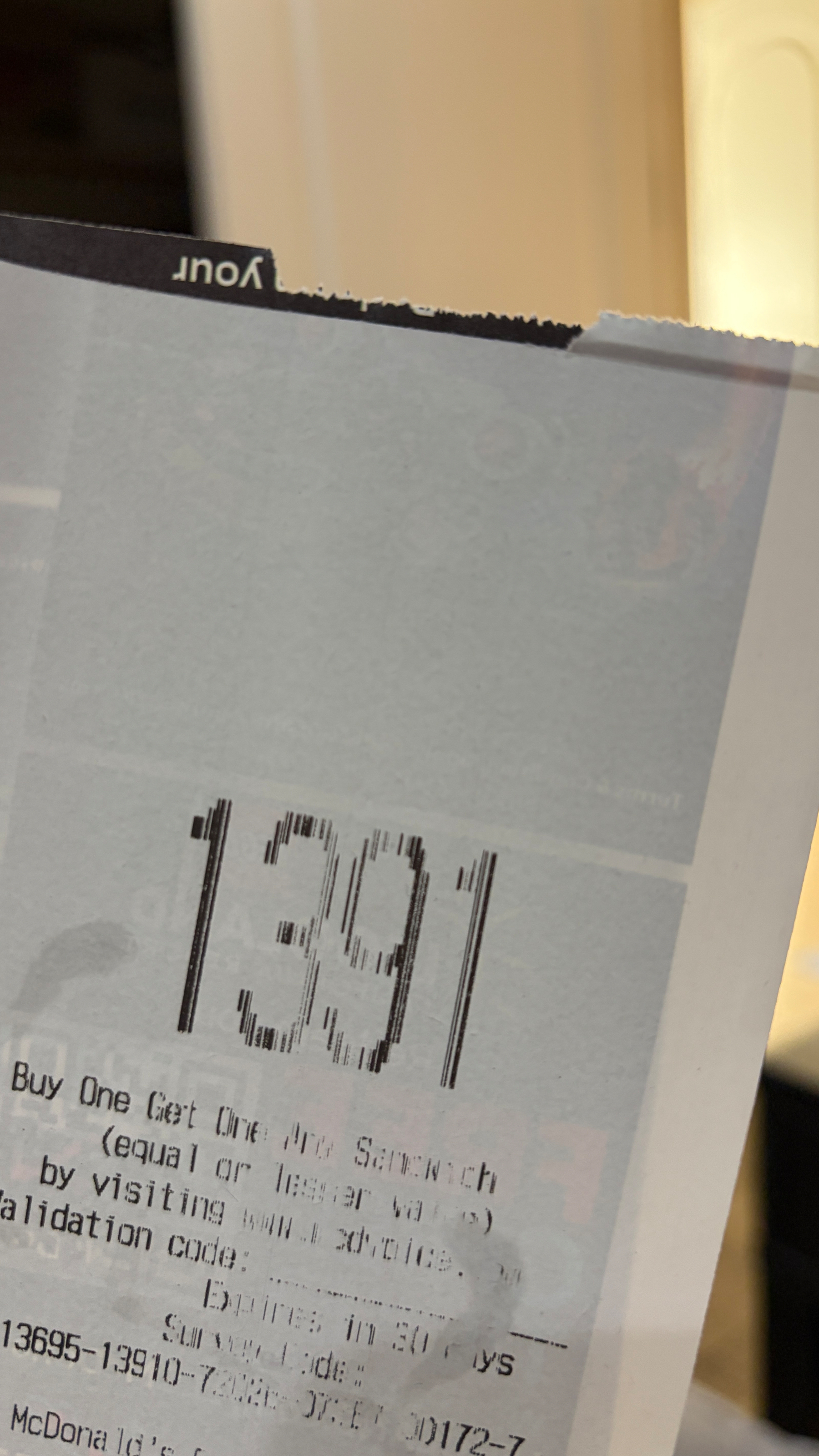 a receipt with “1391” printed in large numerals at the top