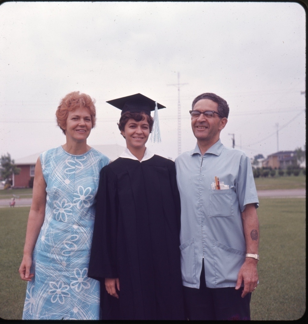 Mom with parents at college graduation.