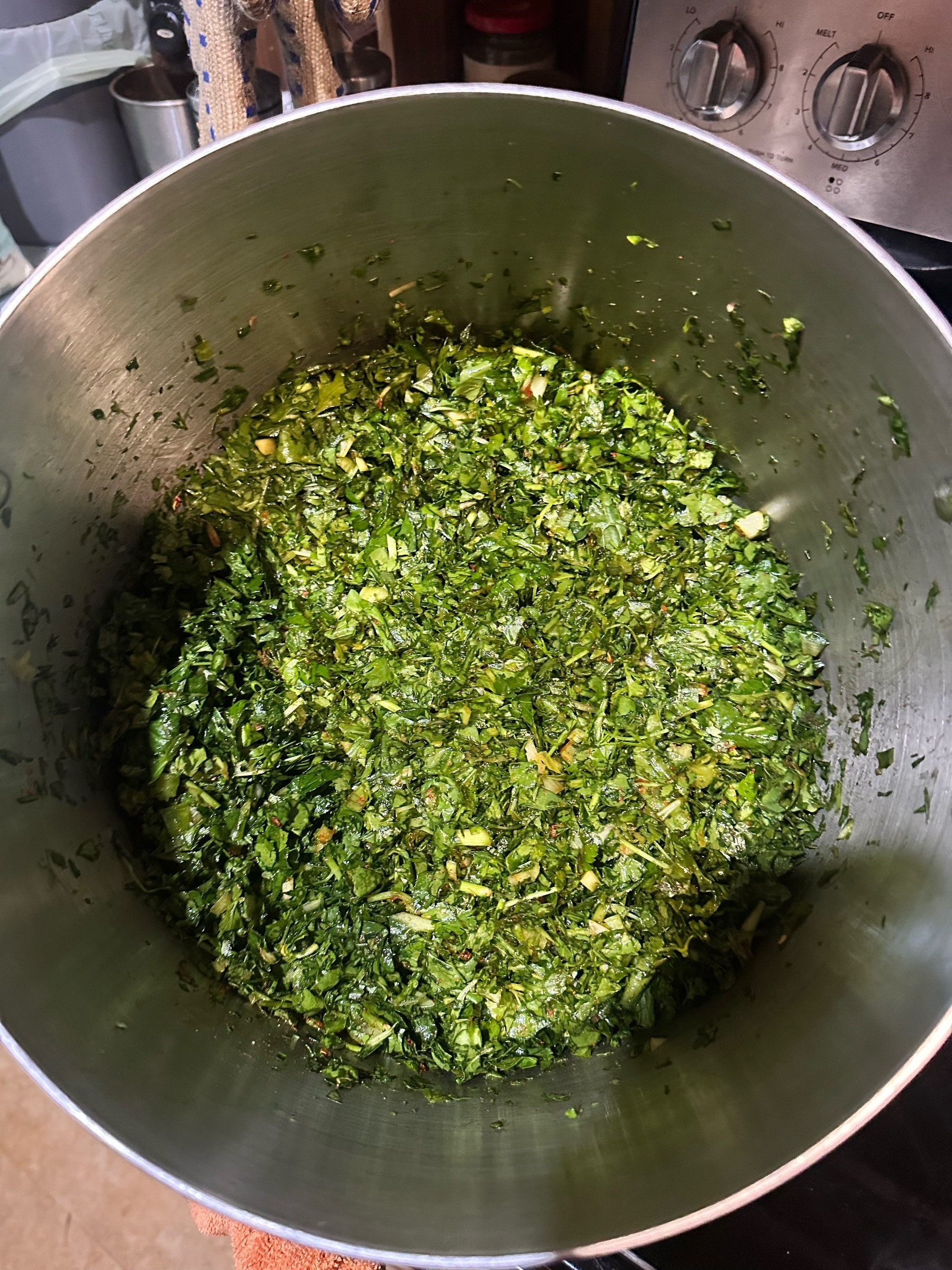 Jake and Meaghan cooking night! 16 cups of greens… 