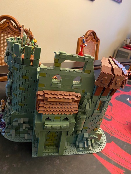 The side/back wall of Castle Grayskull, complete with tiled and curved roofs, windows, etc.