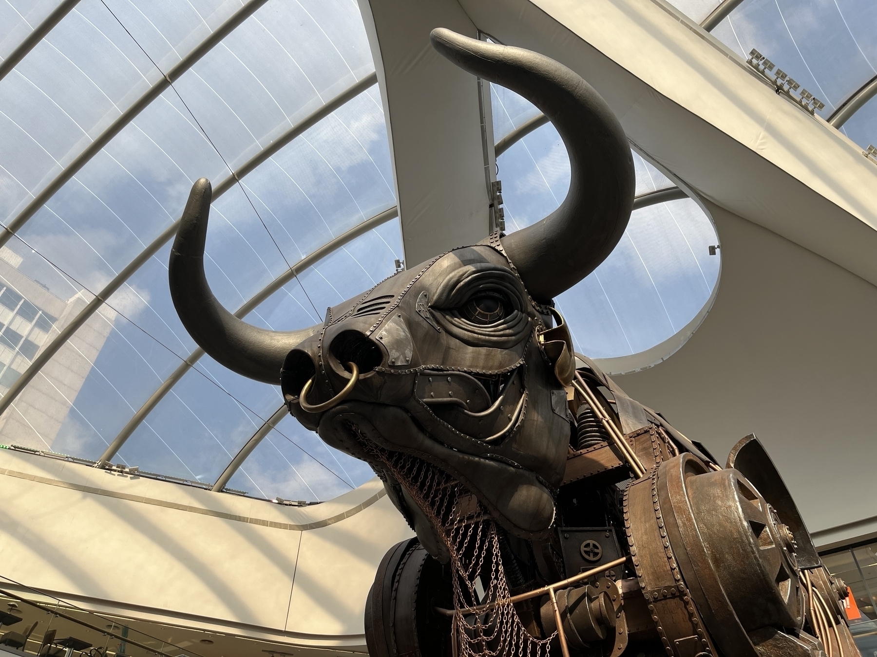 The head of a huge, steel mechanical bull