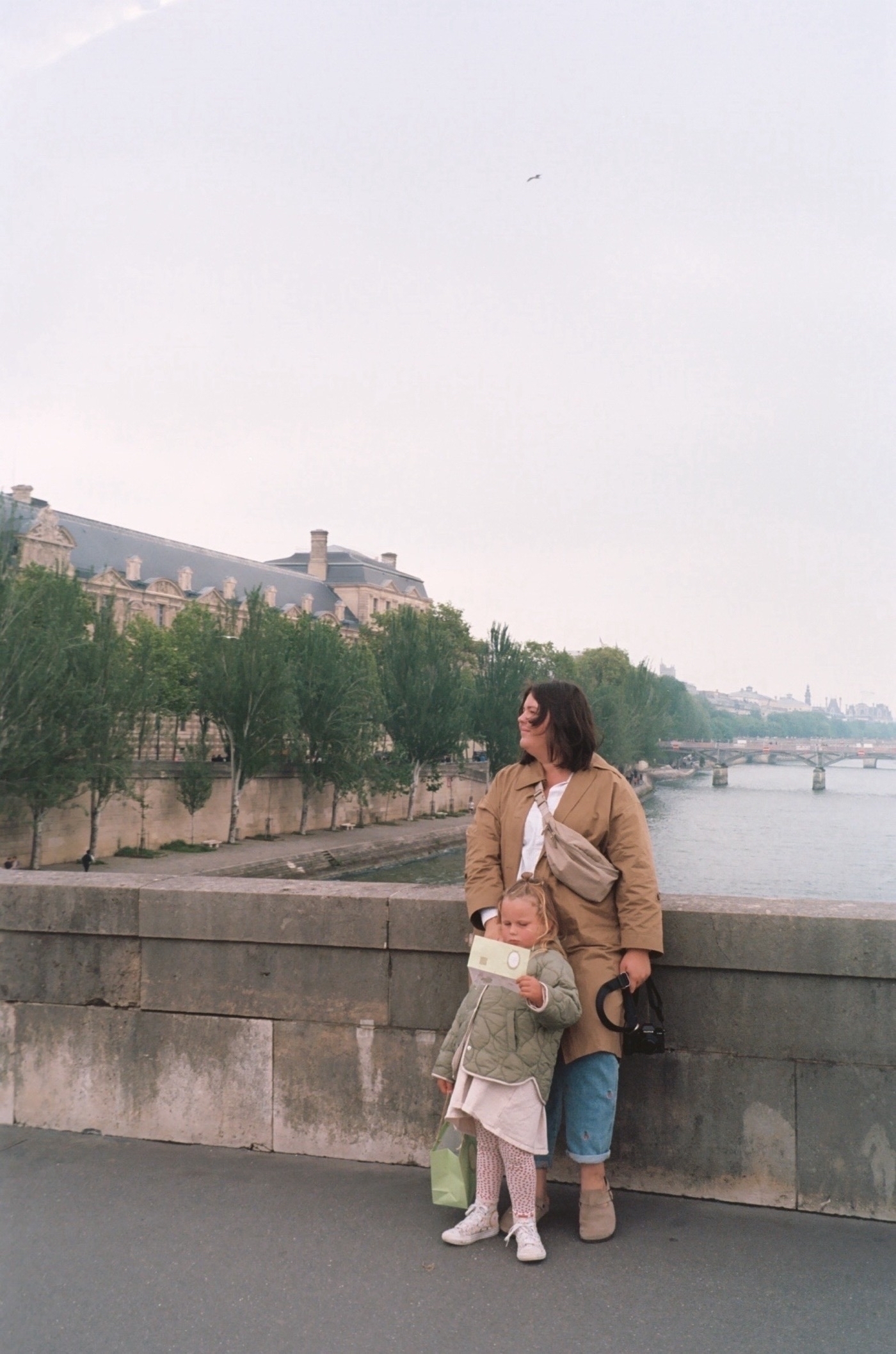 Britt and Luna on a bridge in Paris. Photo taken with Leica Z2X in Paris by Josh Withers.