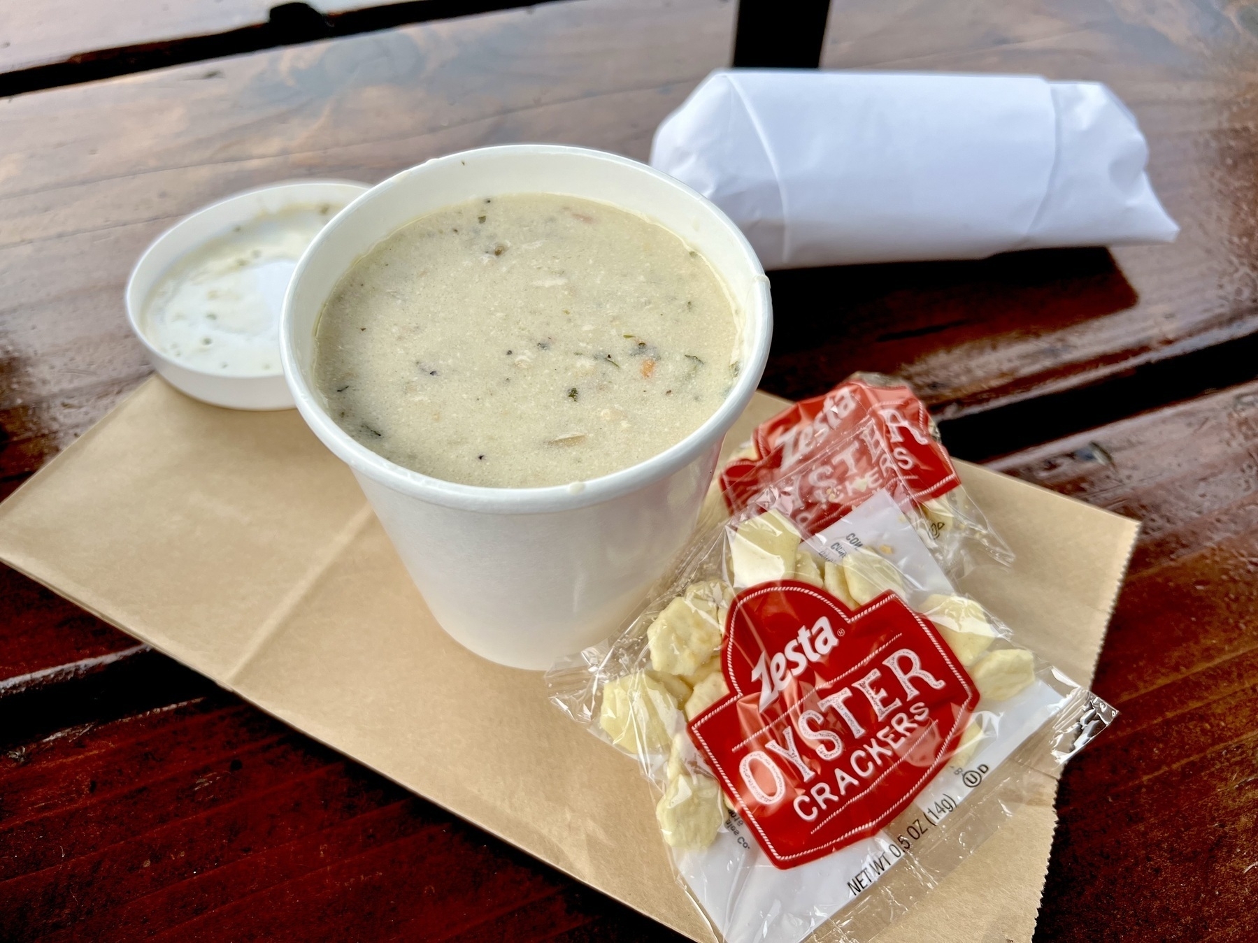 A cup of clam chowder (new England) at Spud Point Crab Co, in Bodega Bay CA. 
