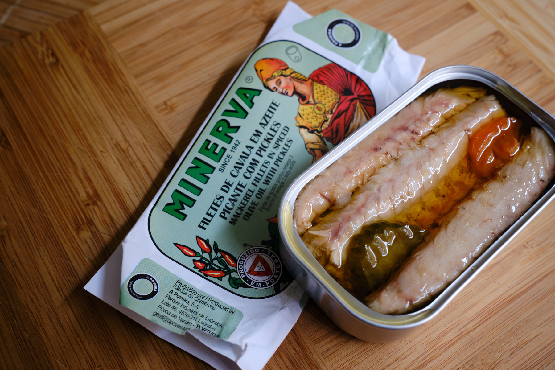 an open tin of Minerva's tinned mackerel in spiced olive oil with pickles