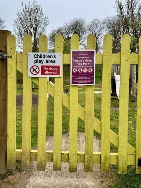 photo of a gate with no dogs allowed signage