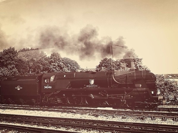 photo of a steam train with a vintage look