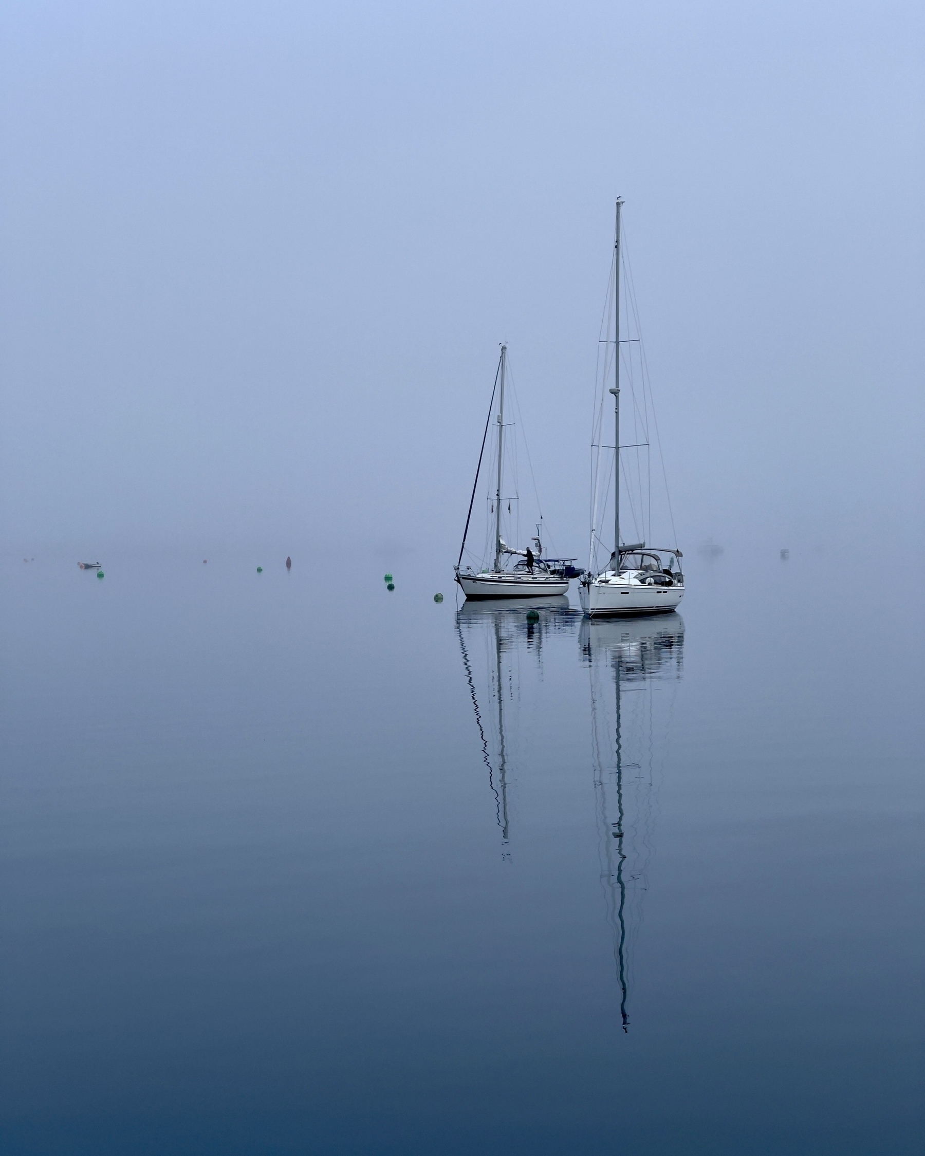 Boats on a foggy morning.