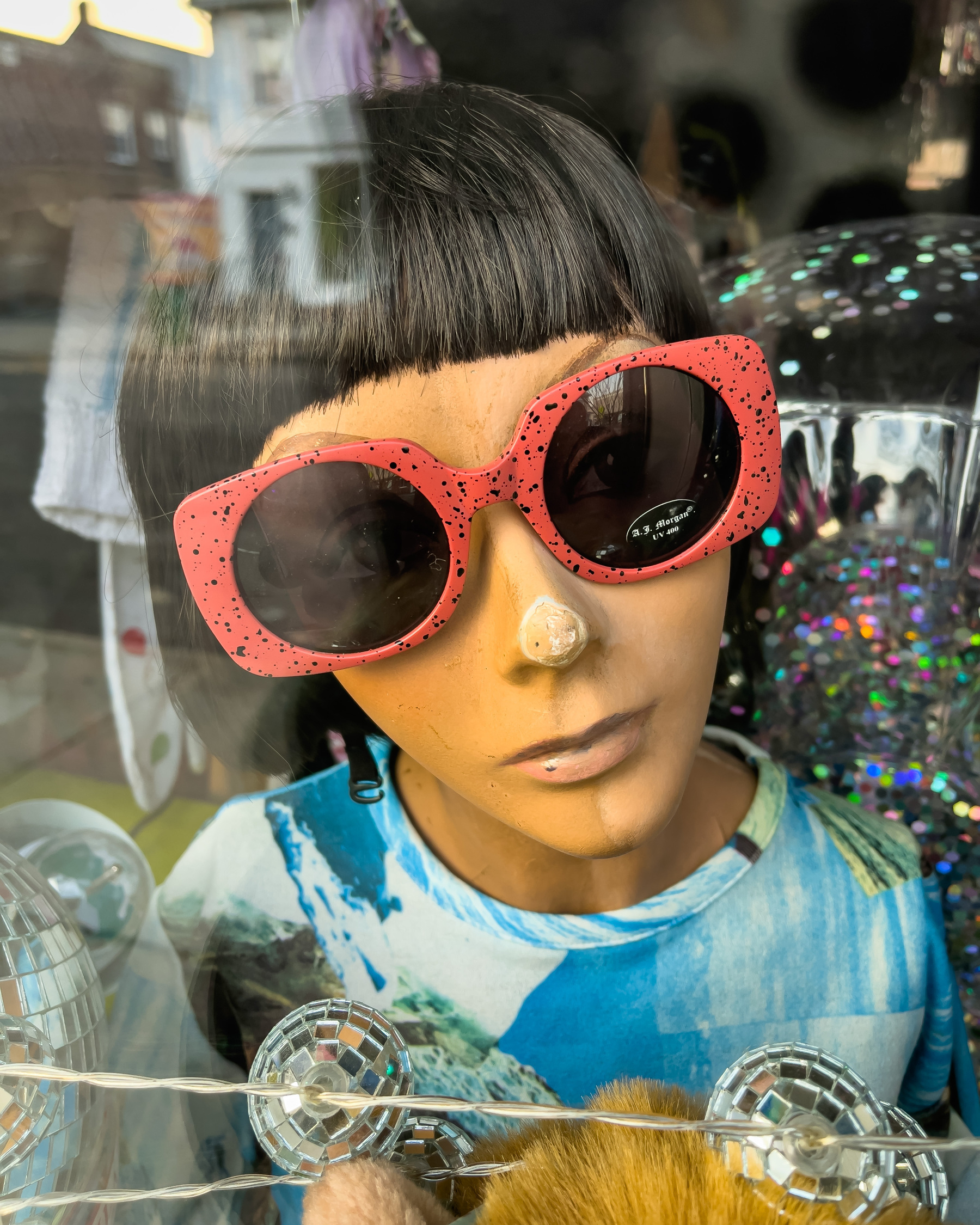 Female mannequin head with sunglasses