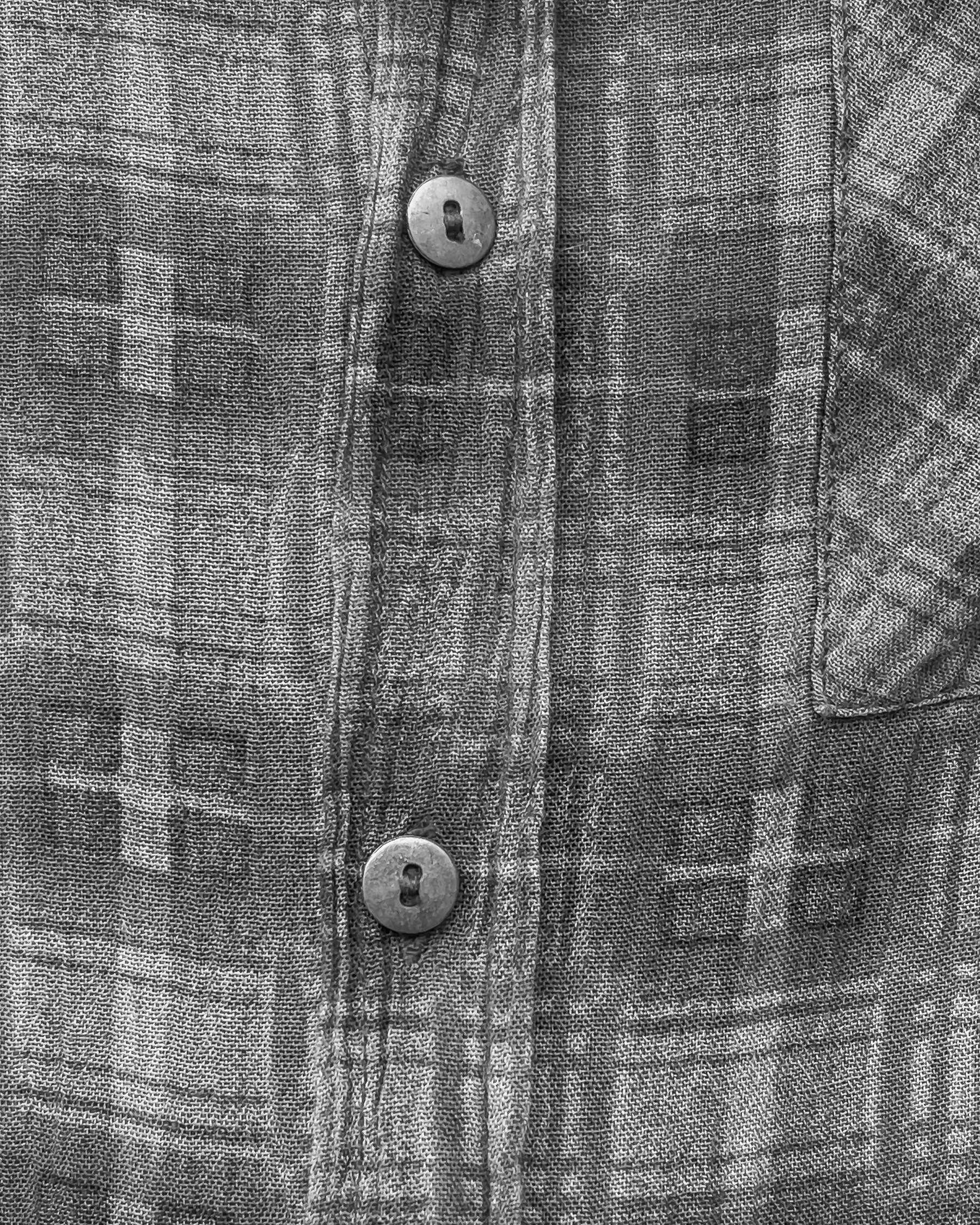 Plaid shirt detail.