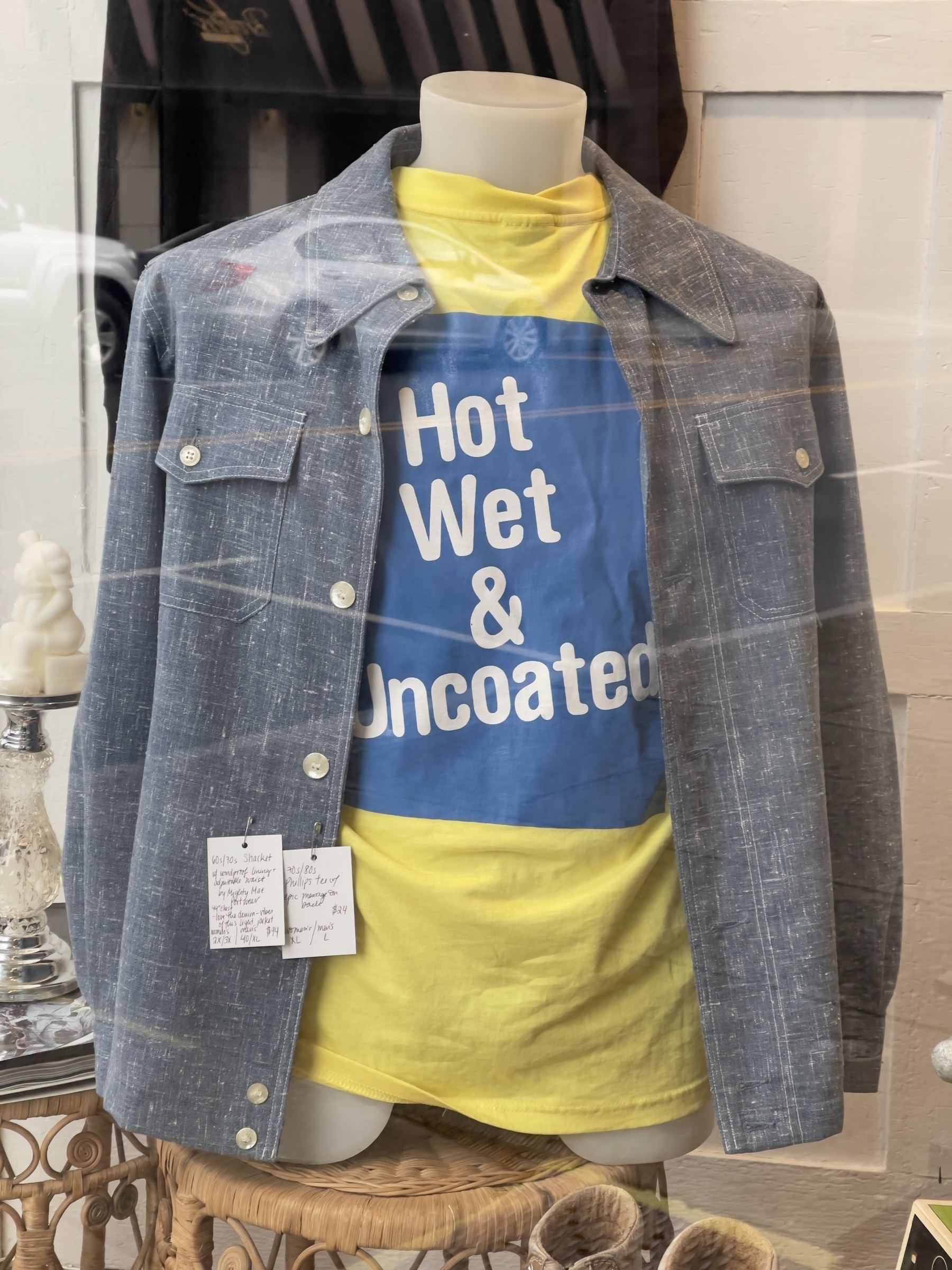 Shop display, “hot, wet and uncoated” t-shirt with denim jacket.