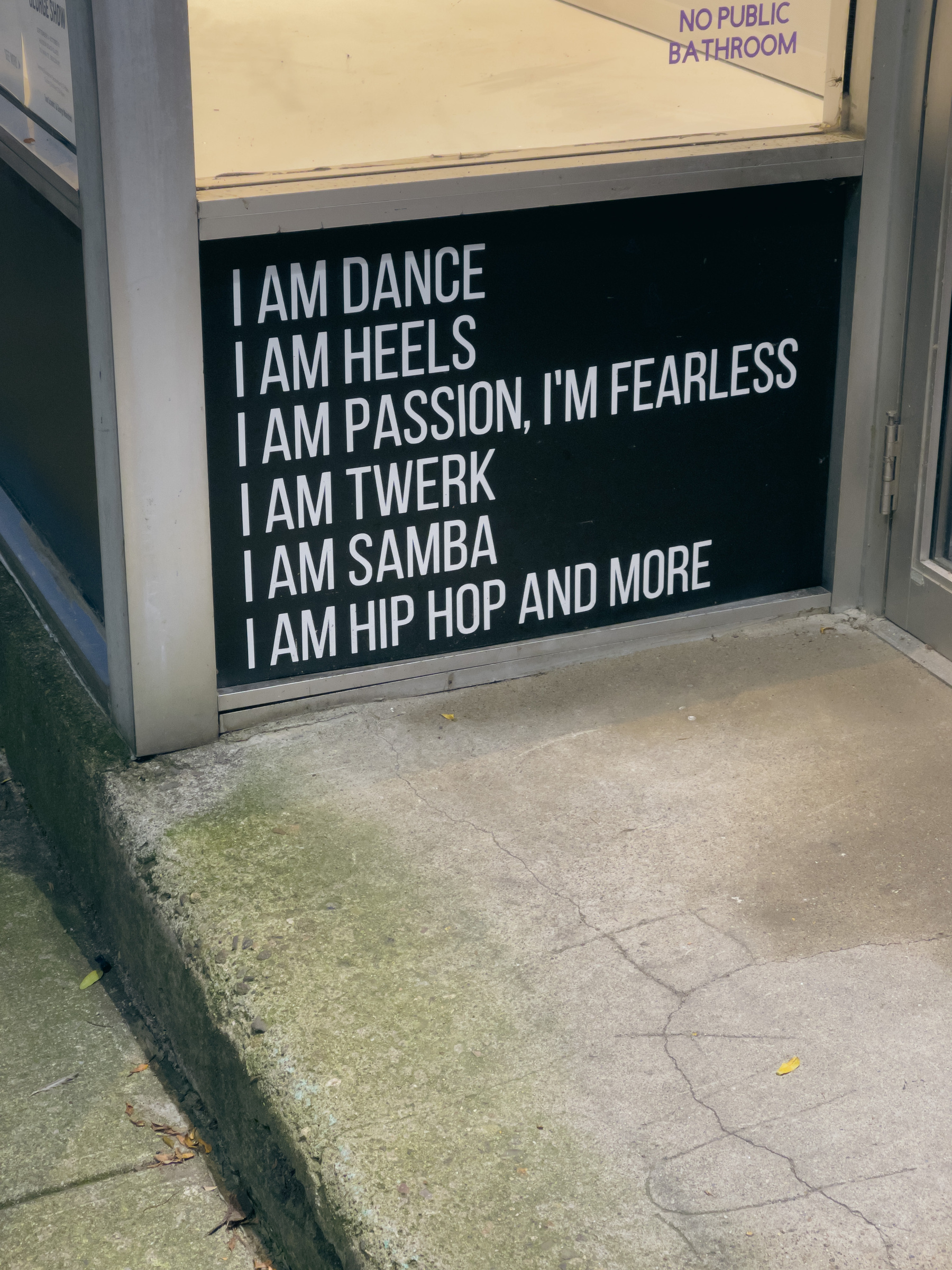 Sign at front entry to building saying I am dance, I am heels, I am passion, I’m fearless, I am twerk, I am samba, I am hip-hop and much more.