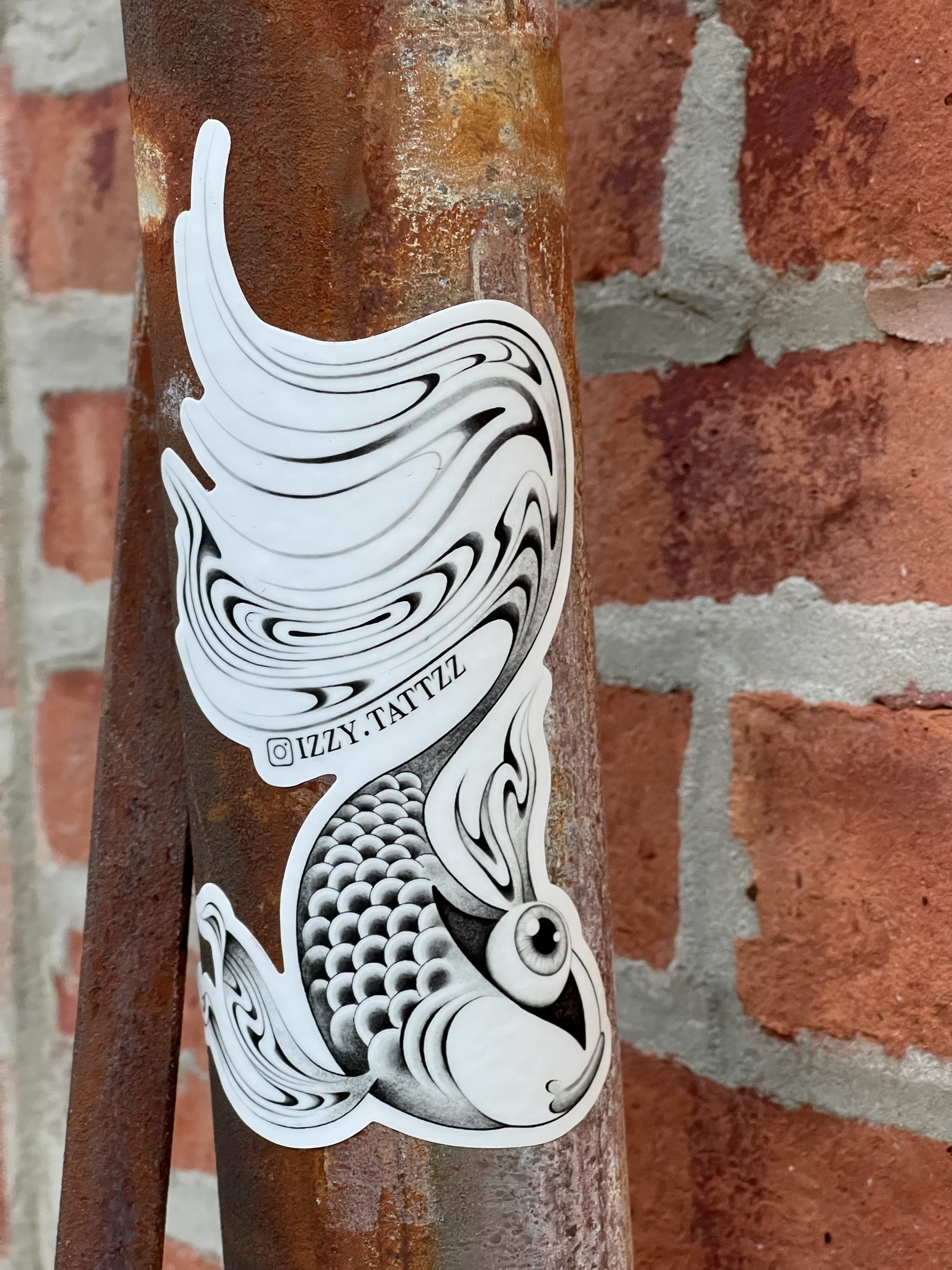 Sticker on an iron pipe for <a href="https://micro.blog/izzy">@izzy</a>