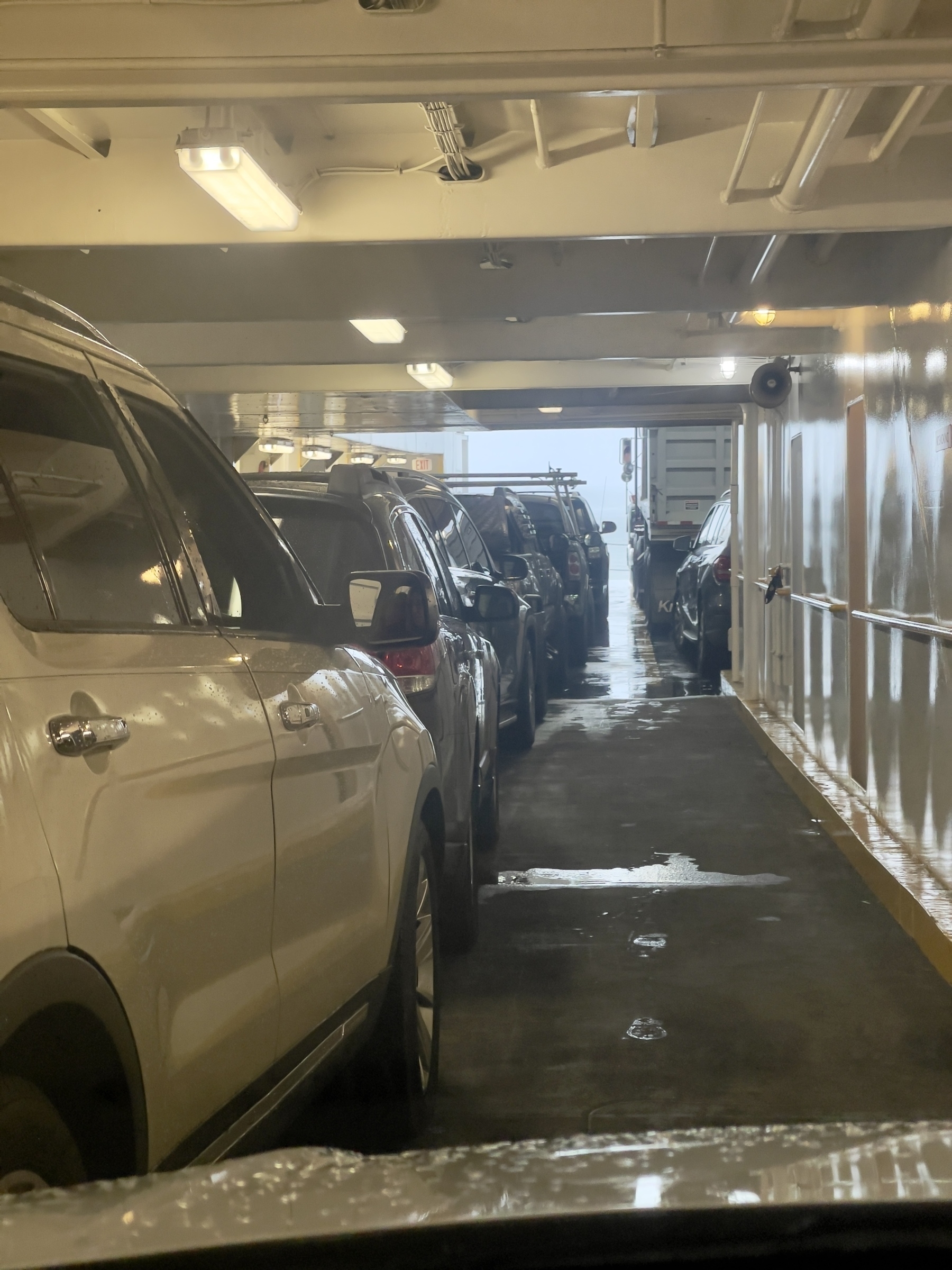 Line of cars on a ferry.