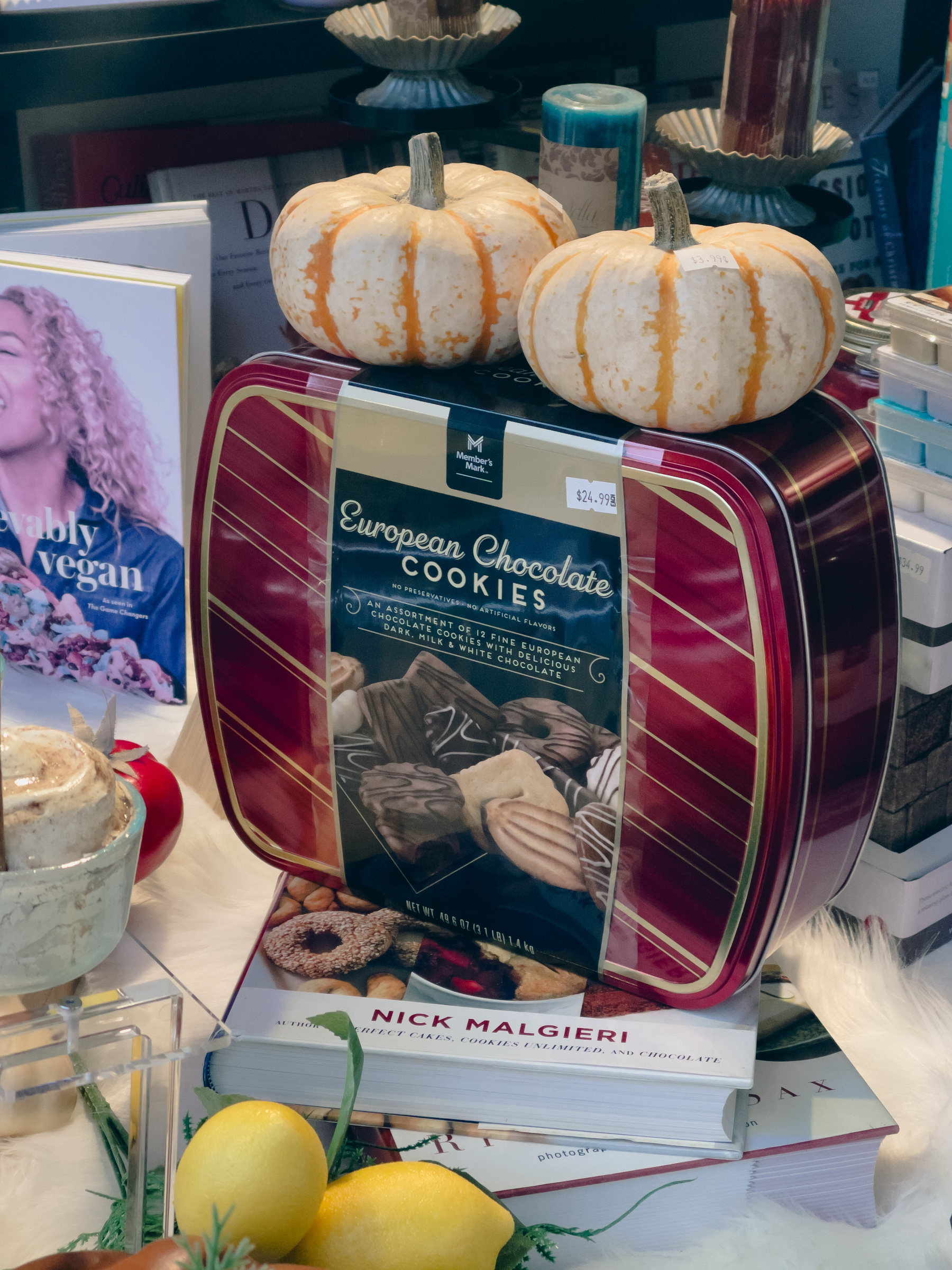 European chocolate cookies tin featured in shop window display.