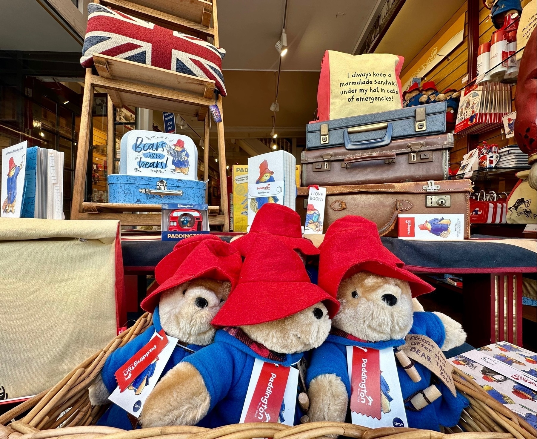 Paddington Bears front and centre, the contents of a shop window full of Paddington memorabilia, and other British products comprising the British flag