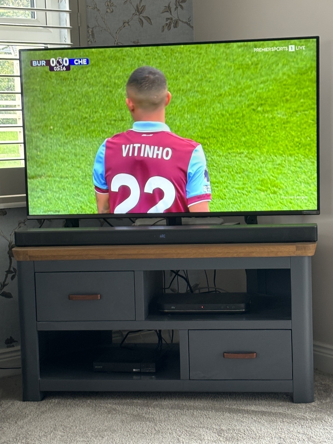 Photo of a television showing Burnley v Chelsea. 