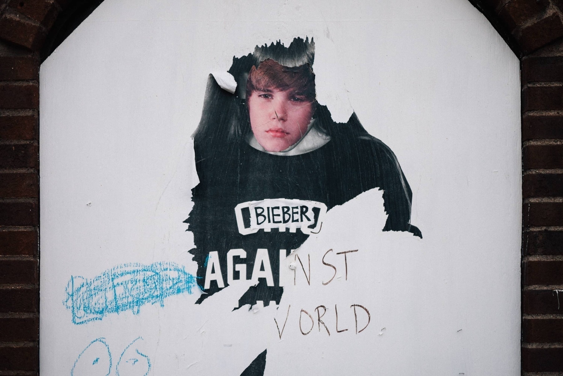 Mural that originally said OHIO AGAINST THE WORLD has ohio replaced with BIEBER - Lumix GF1 