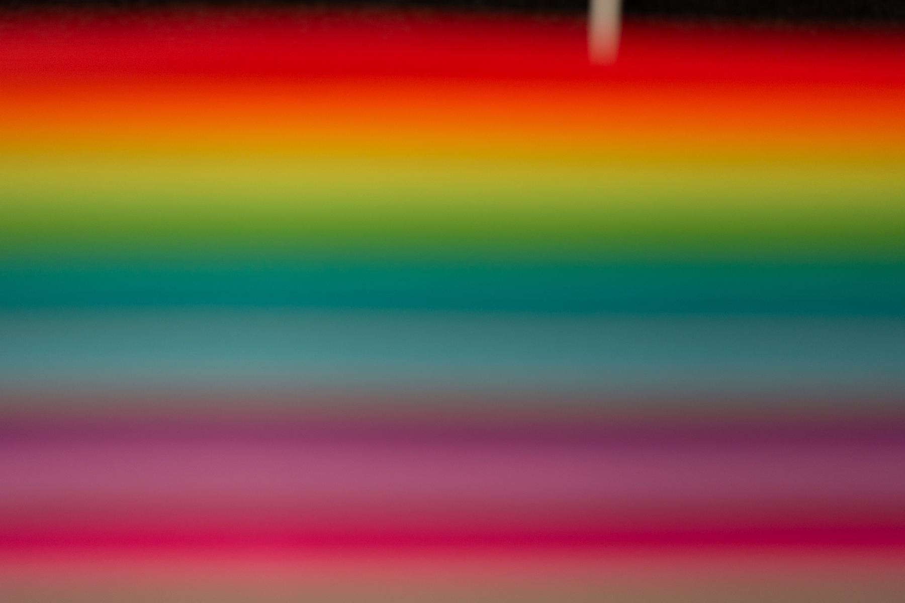 Stack of colored paper out of focus - Sony RX100