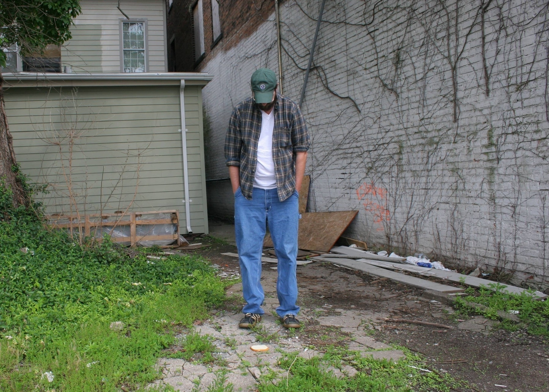 Man looks at bread on ground - Canon 20D