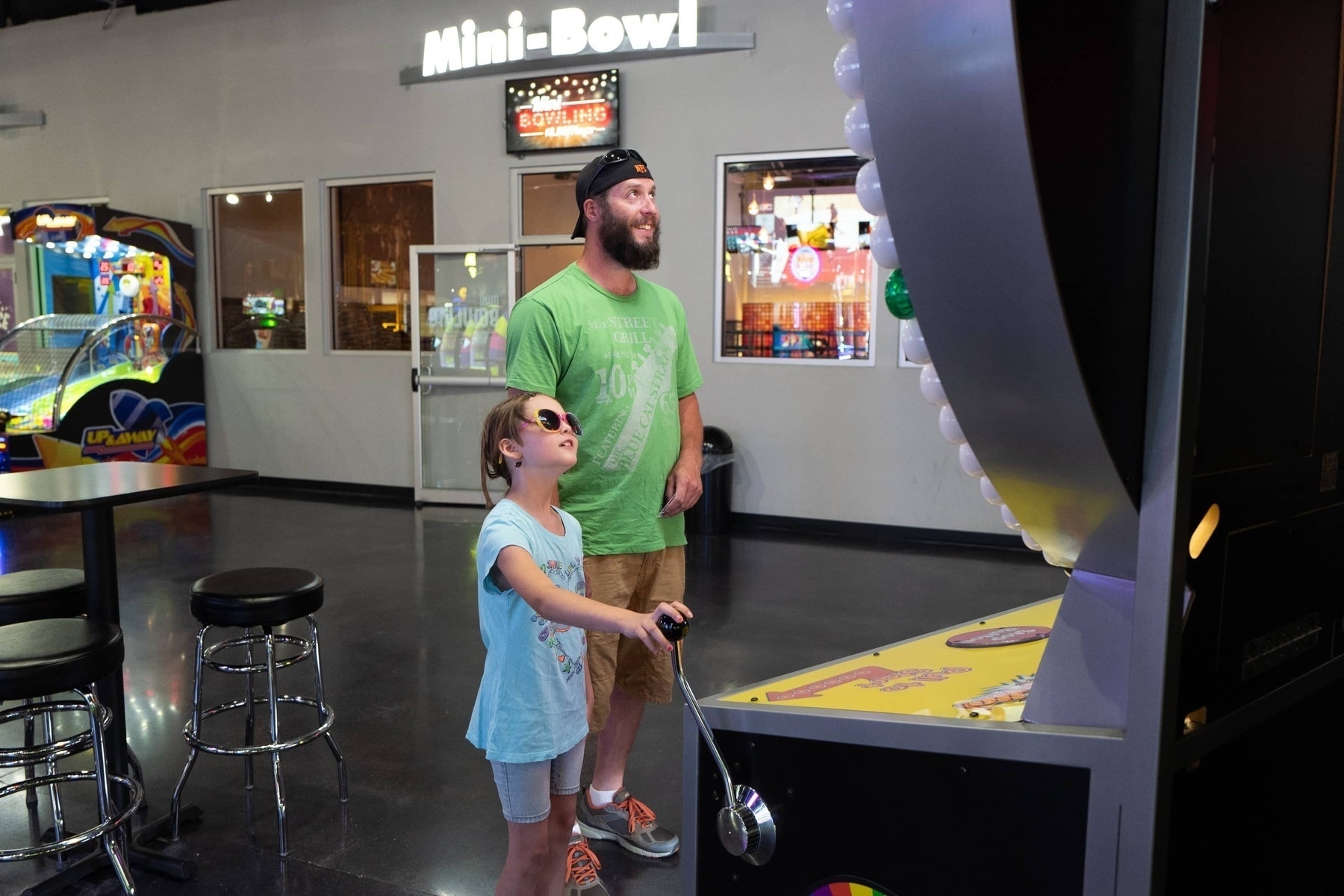 Daughter and father get ready to spin the wheel - Leica Q