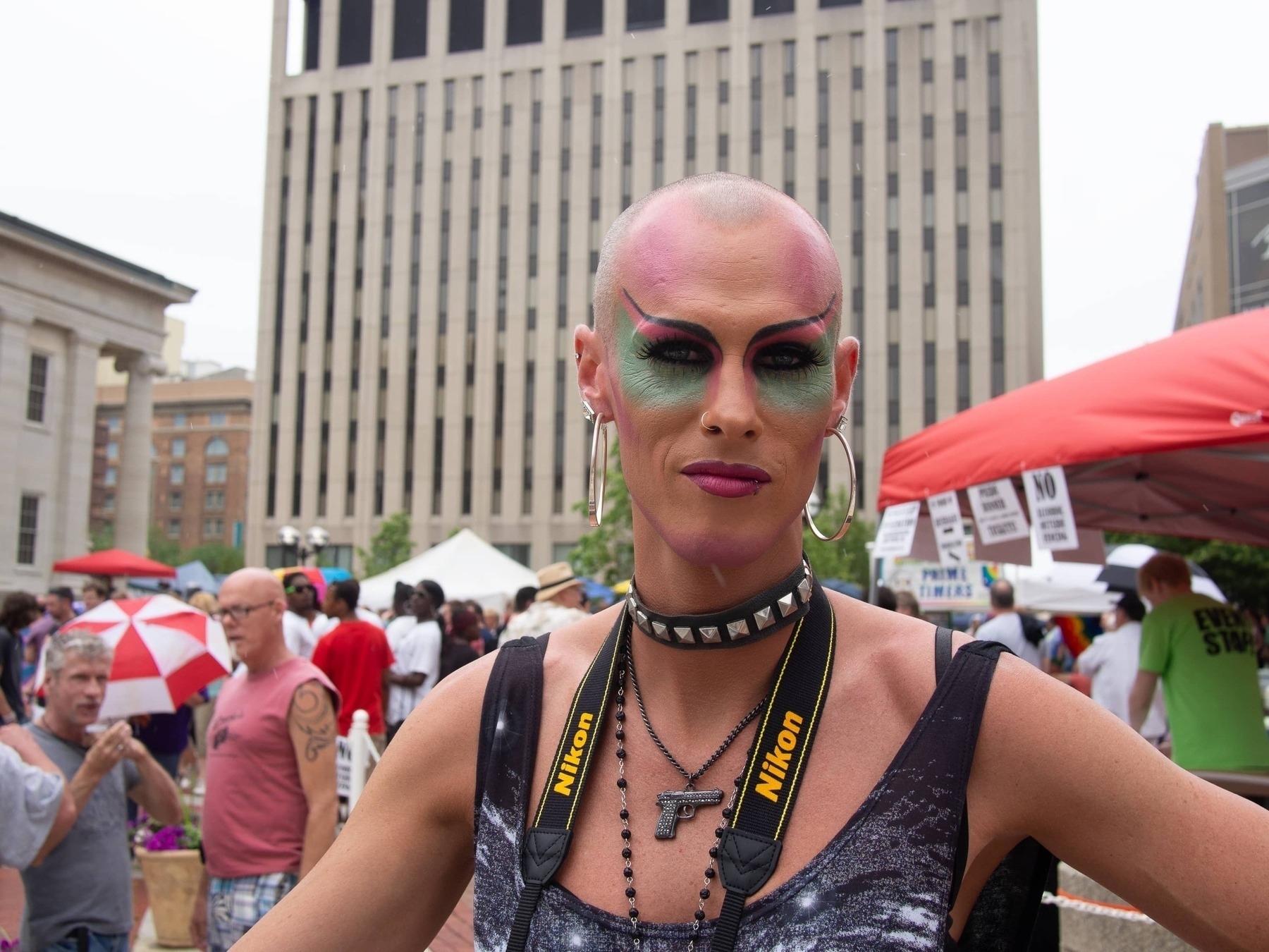 Person in colorful makeup and resilient expression - Olympus E-M5