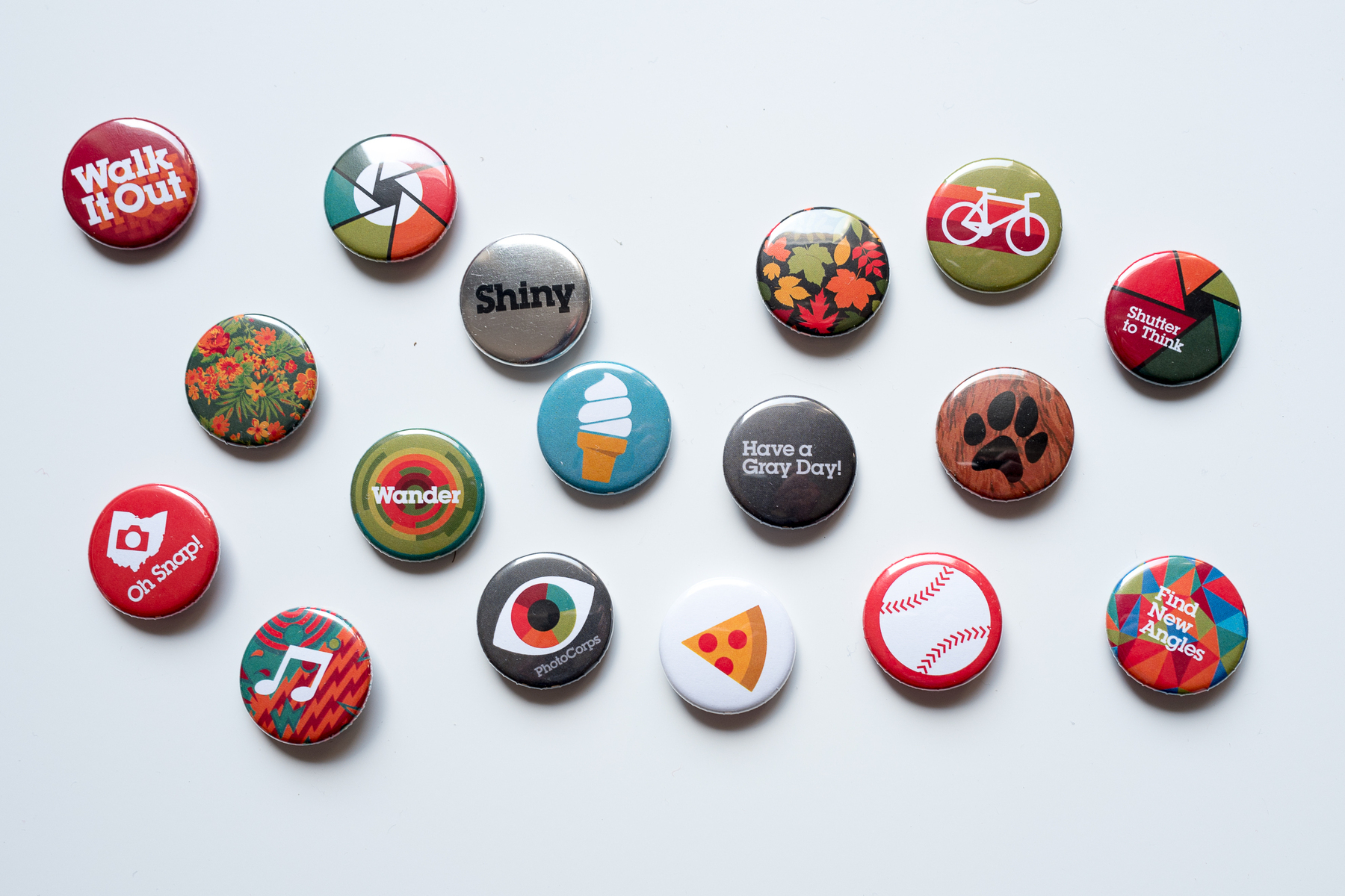 Various pins with icons that represent photo prompts - Leica Q