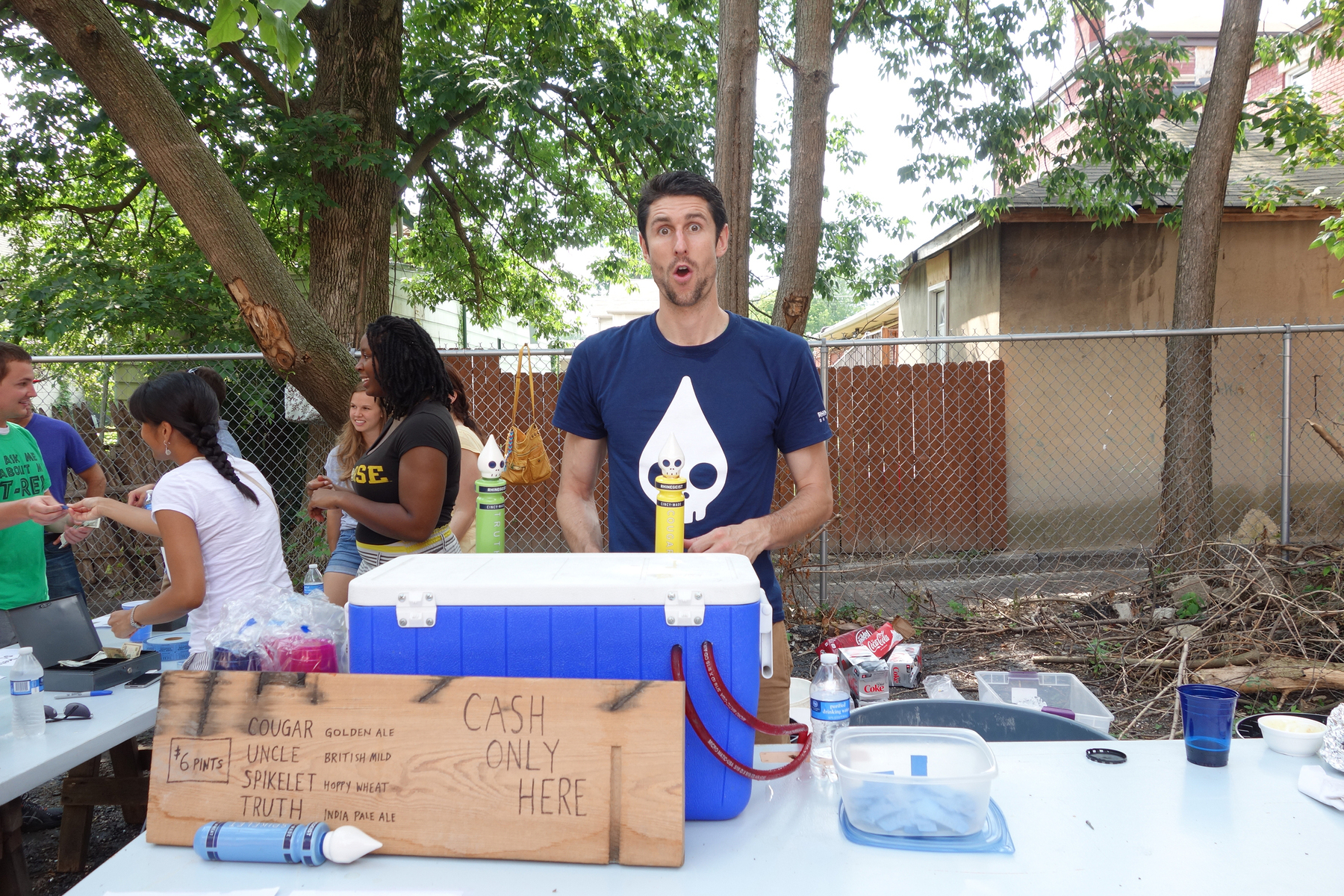 Bryant Goulding of Rhinegeist brewery serves up beer in a new public space in Walnut Hills, Cincinnati - Sony RX100