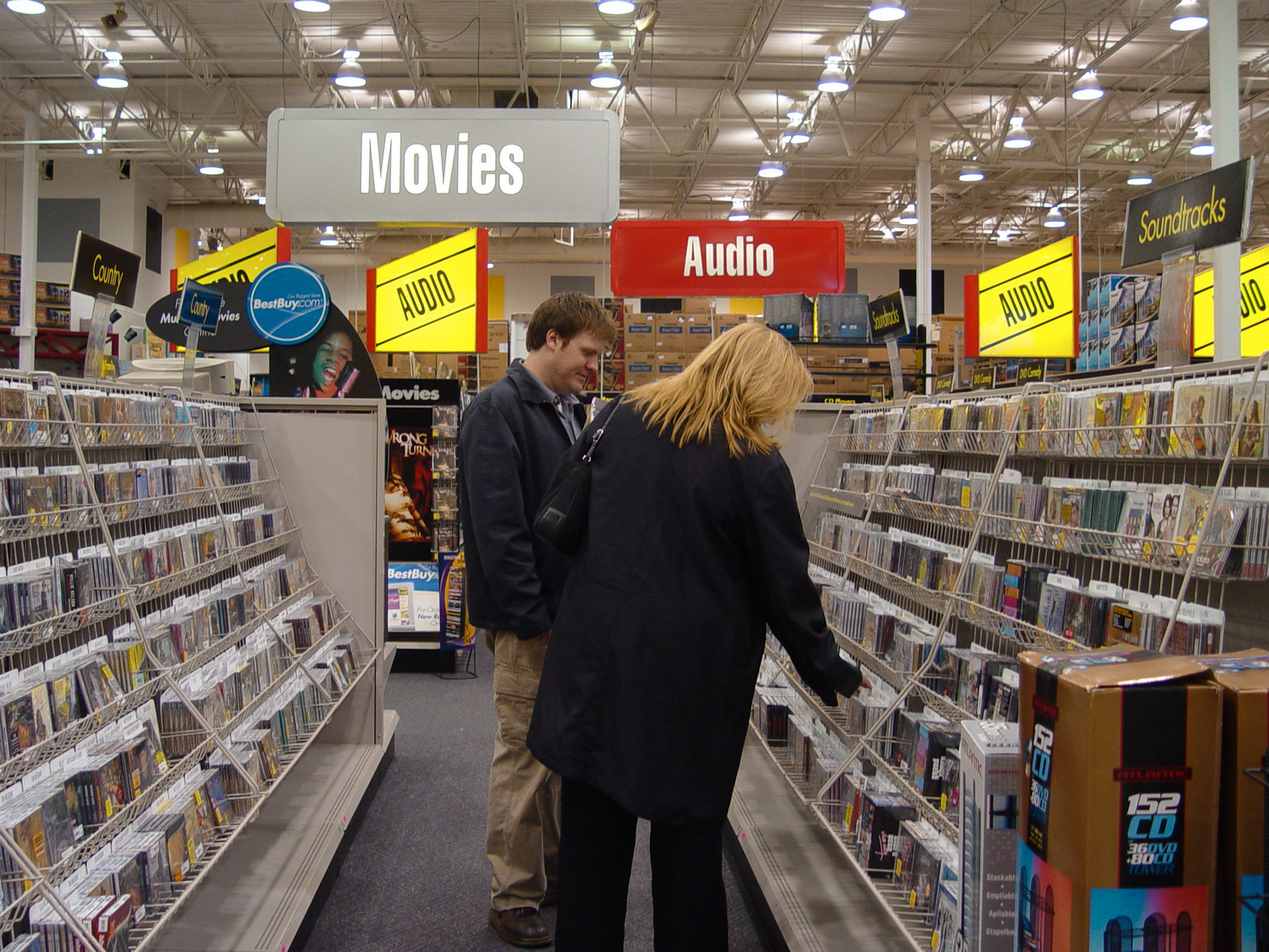 Folks browse the CD section at Best Buy - Sony CyberShot