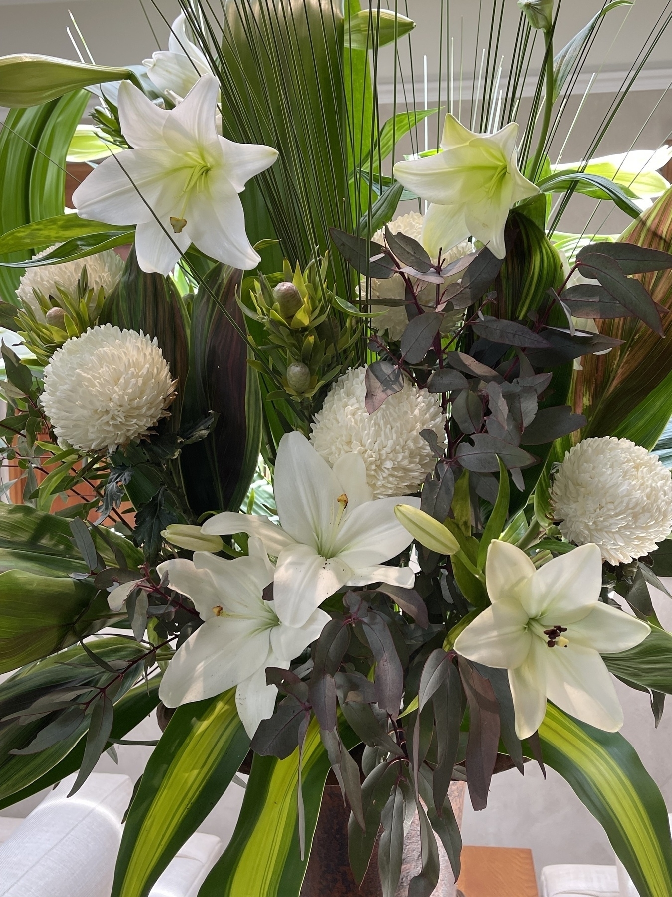 A large bouquet of white and green flowers.
