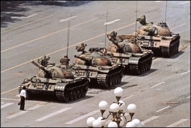 "Tank Man" blocks a column of Type 59 tanks heading east on Beijing's Chang'an Boulevard (Avenue of Eternal Peace) near Tiananmen Square during the Tiananmen Square protests of 1989.