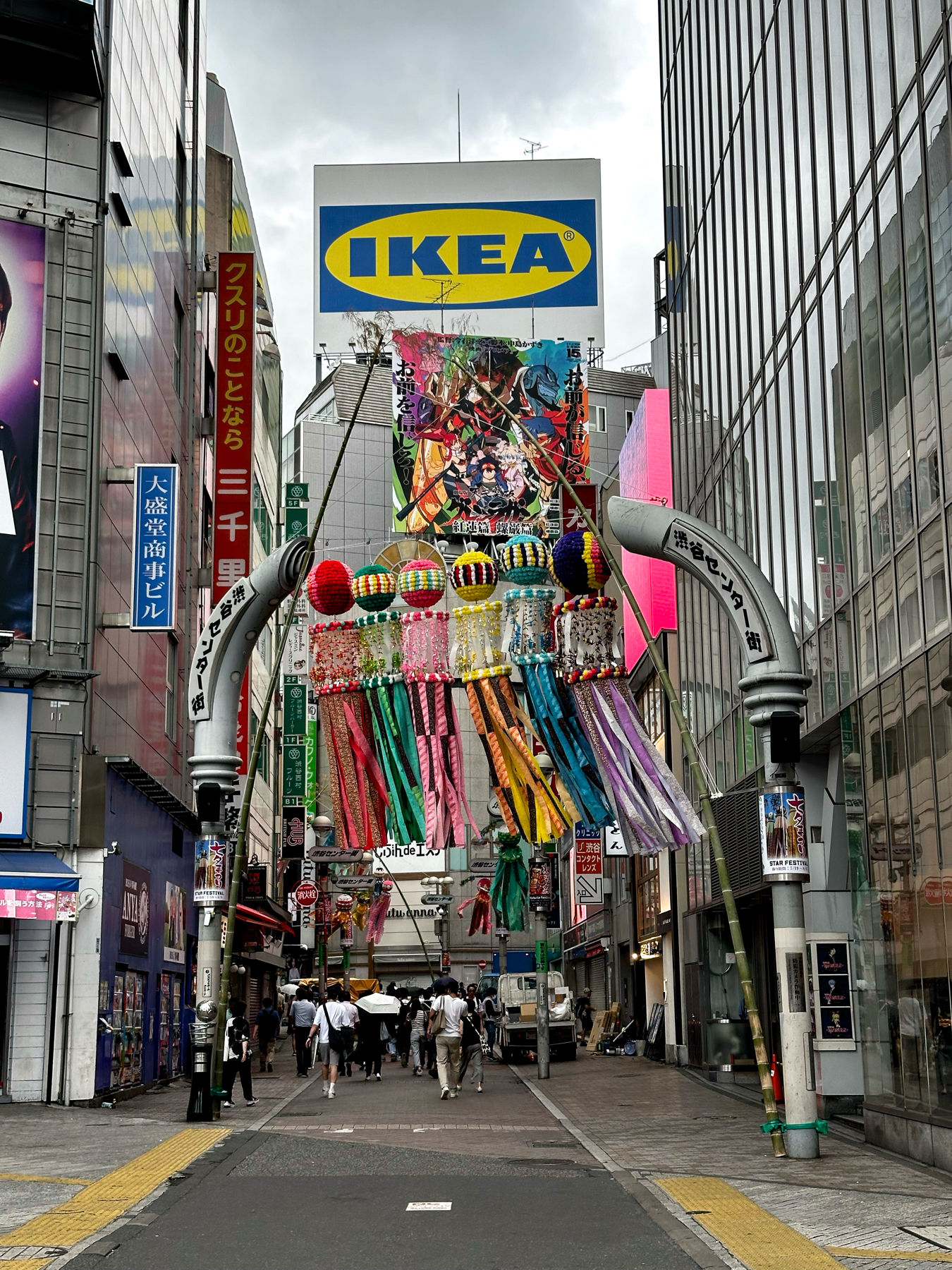 The entrance to basketball street in Shibuya. Colourful ribbon streamers welcome you to to the neighbourhood
